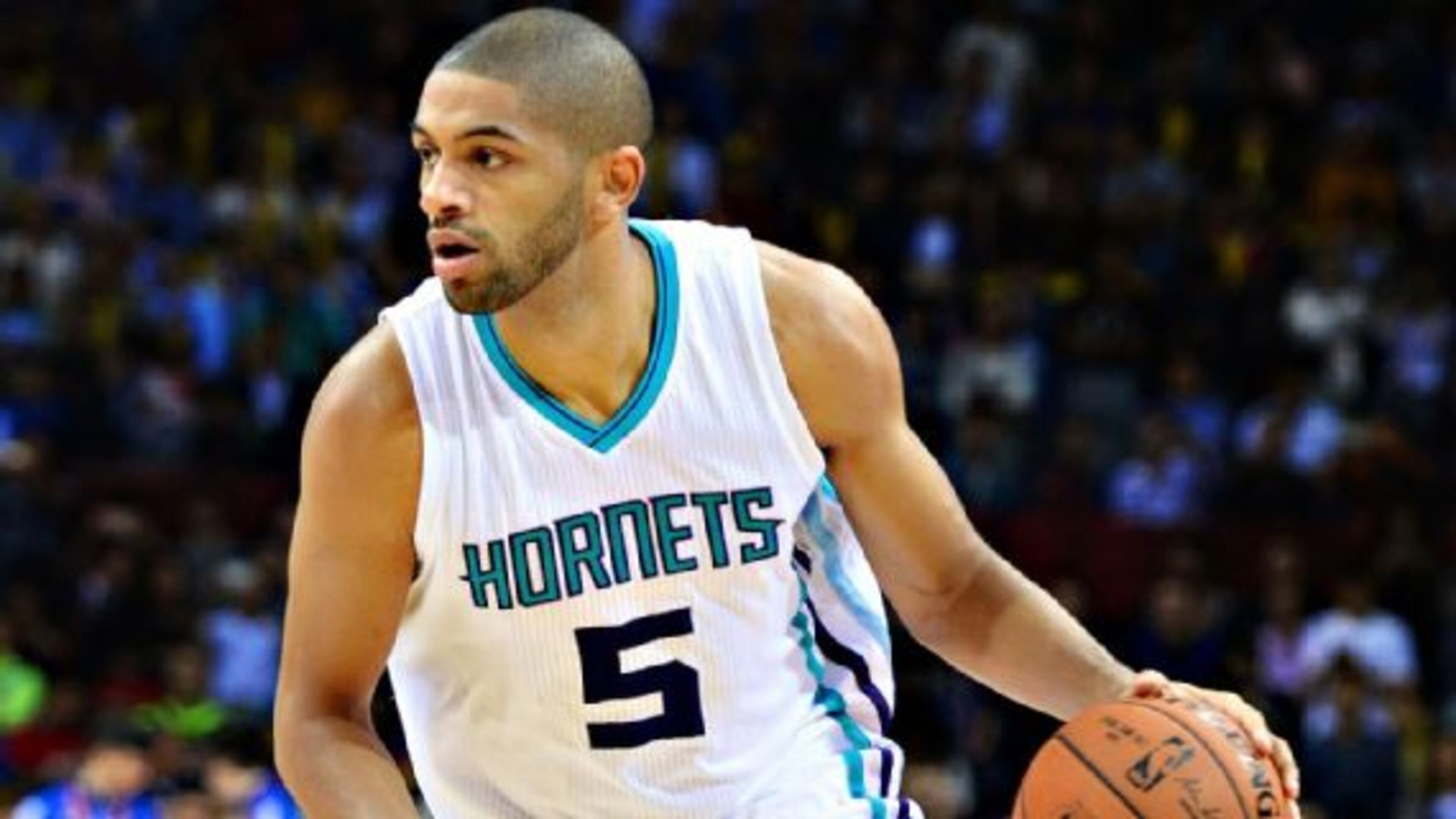 The Hawks won't have to face Nicolas Batum when they play at Charlotte on Friday. (Andrew D. Bernstein/NBAE/Getty Images)
