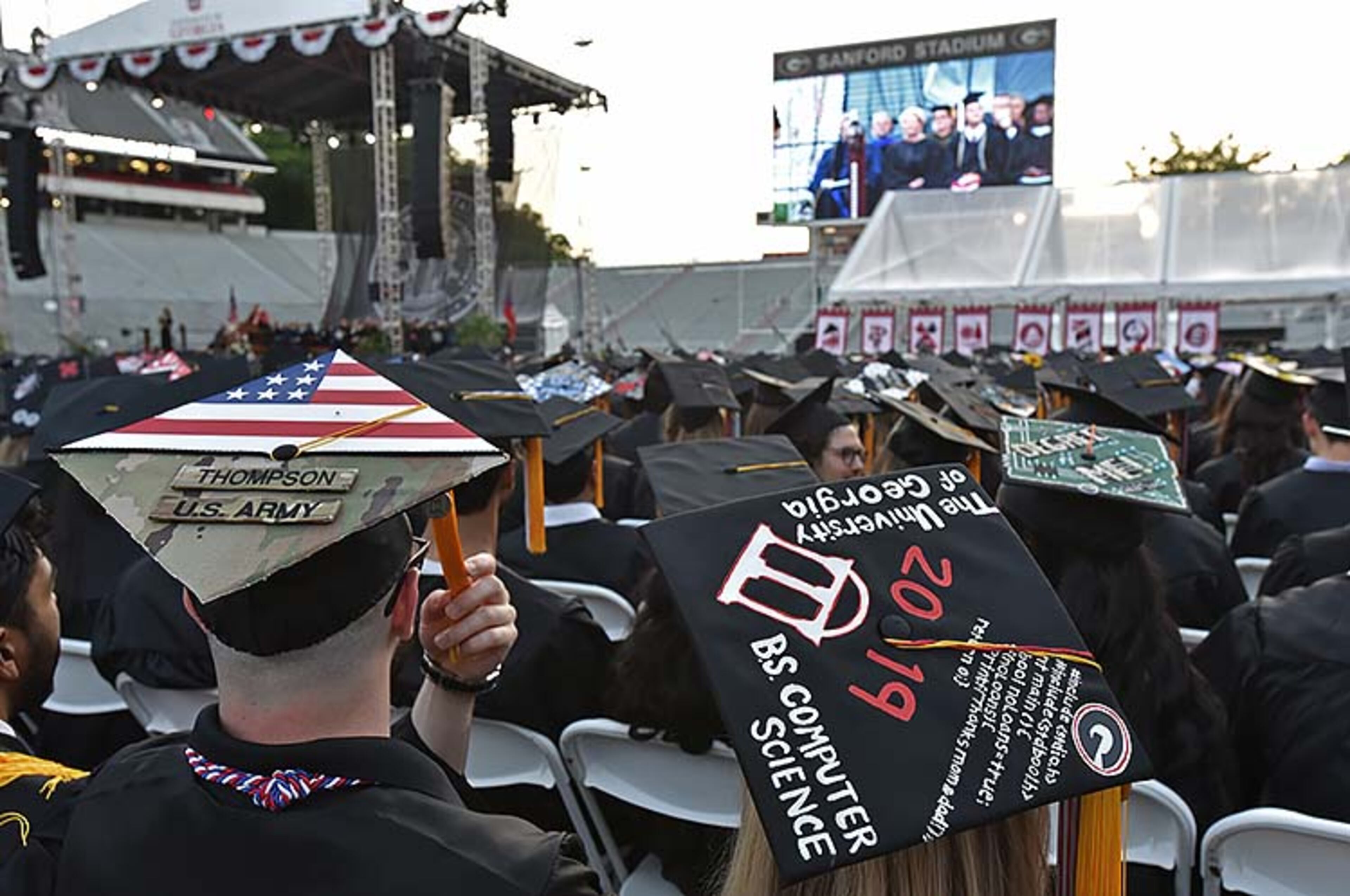 May 10, 2019 Athens - University of Georgia students personalized their mortar boards during 2019 spring undergraduate commencement ceremony at Sanford Stadium in Athens on Friday, May 10, 2019. HYOSUB SHIN / HSHIN@AJC.COM