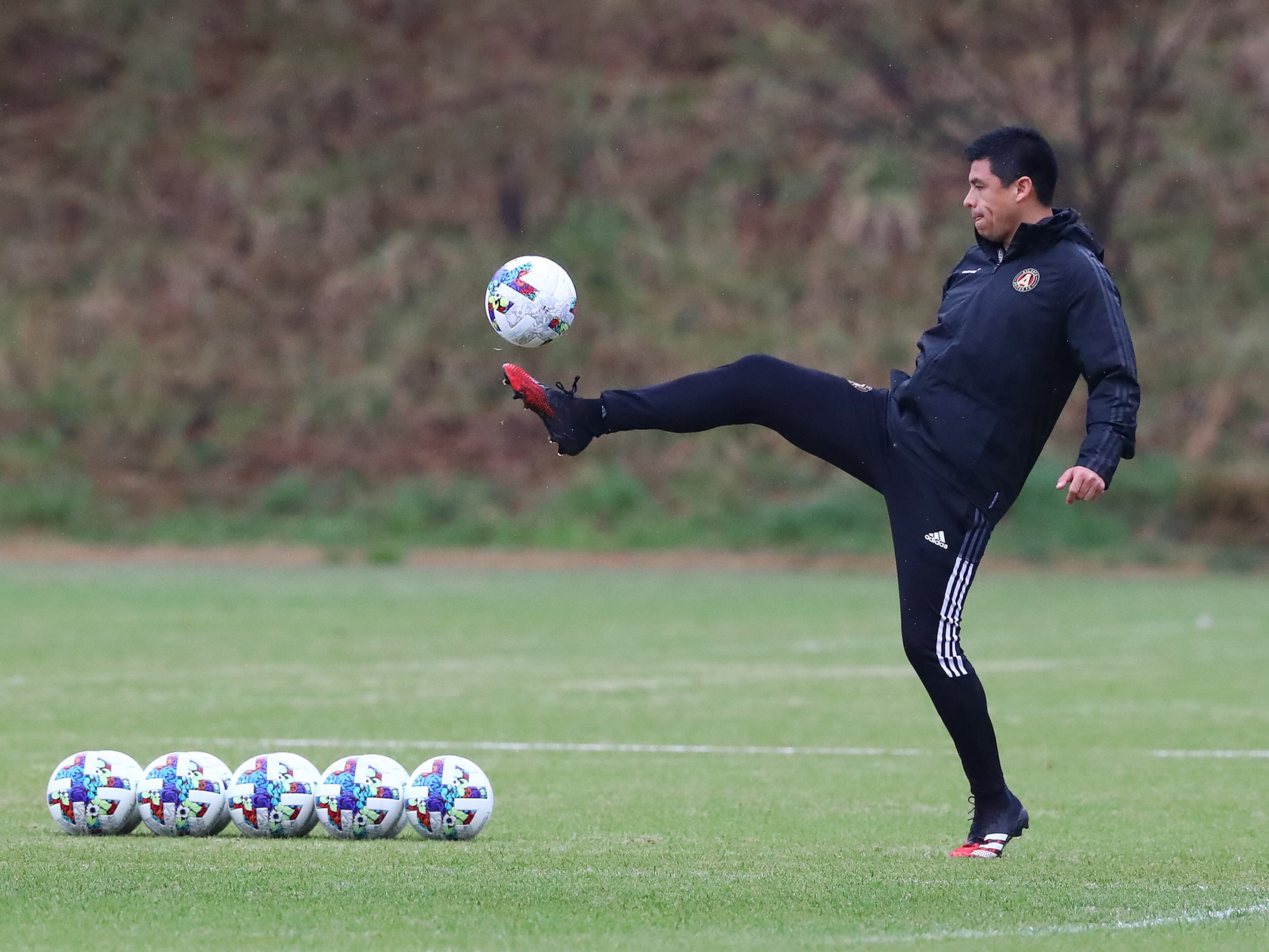 022322 Marietta: Atlanta United head coach Gonzalo Pineda shows he still has form following a 13-year playing career as he prepares to lead his team through practice on Wednesday, Feb. 23, 2022, in Marietta. “Curtis Compton / Curtis.Compton@ajc.com”`