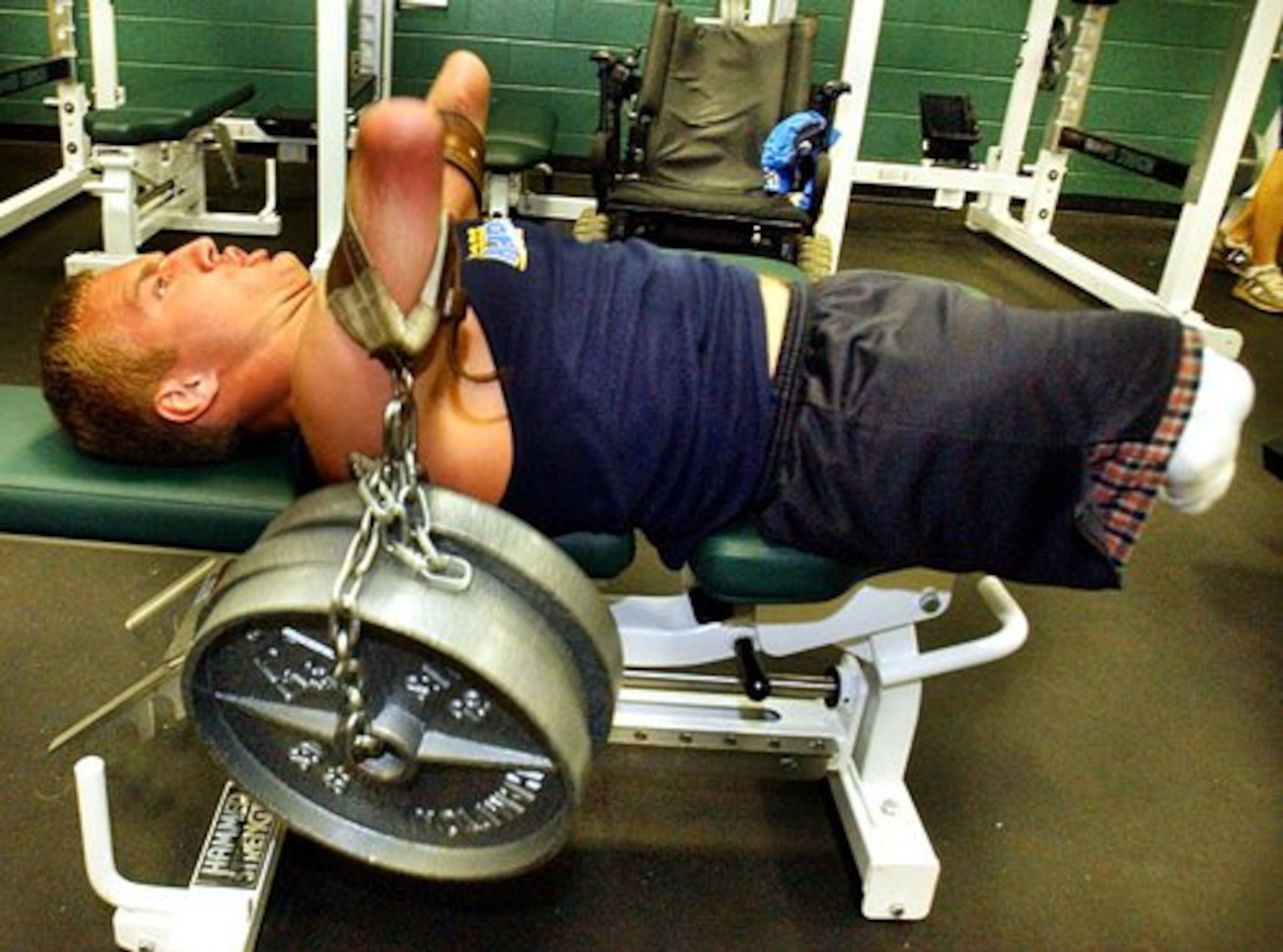 Maynard lifts 210 lbs. in the Collins Hill High School gym in this 2004 photo.