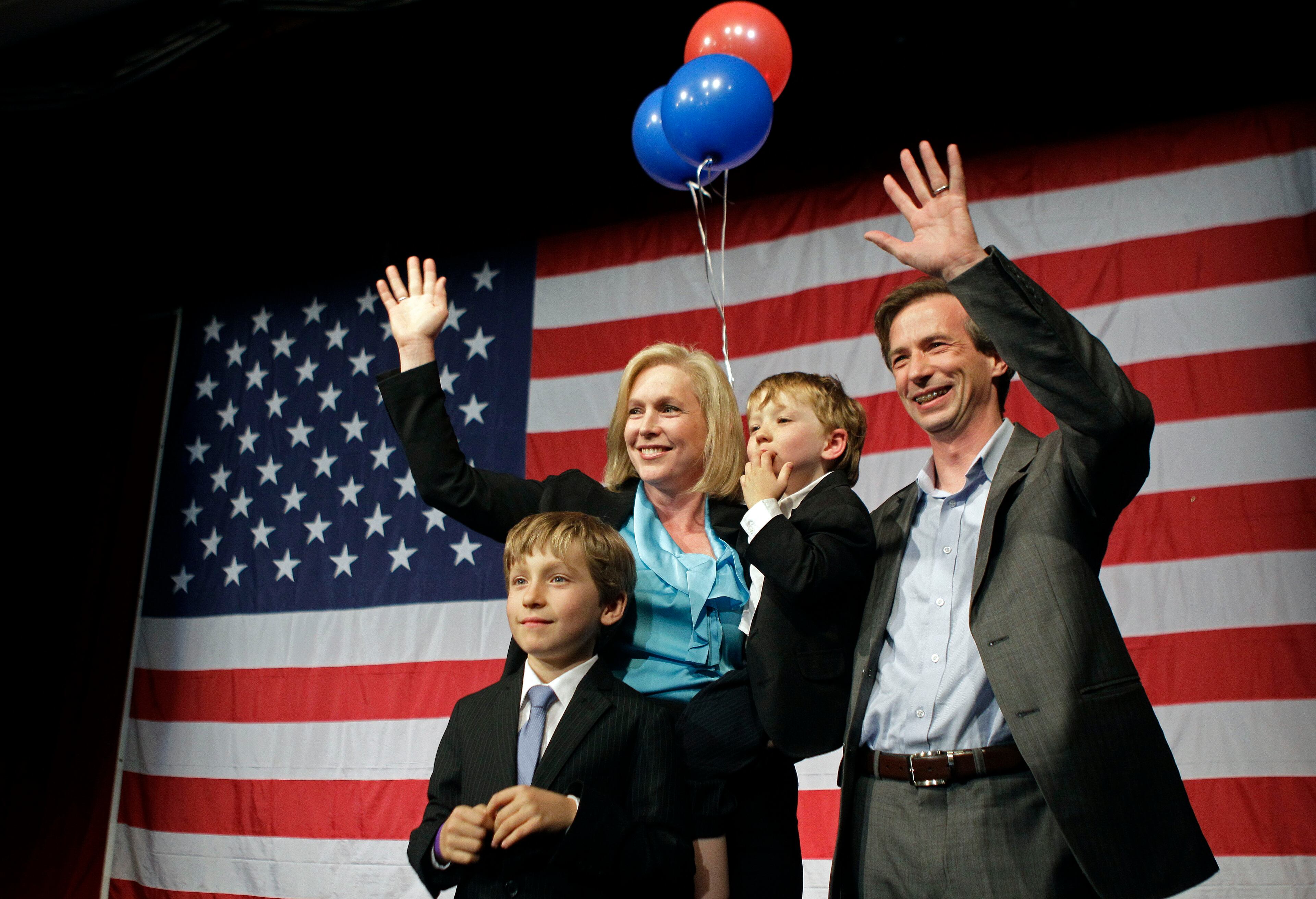 U.S. Sen. Kirsten Gillibrand D-N.Y., left, husband Jonathan, and sons Henry, 4, and Theodore, 8, celebrate on stage at New York State Democratic Headquarters after Gillbrand was predicted to win election for a full term as senator, Tuesday, Nov. 6, 2012, in New York. Gillbrand was pitted against Republican opponent Wendy Long. When the 113th Congress convenes next year, one of every five members of the Senate will be women.