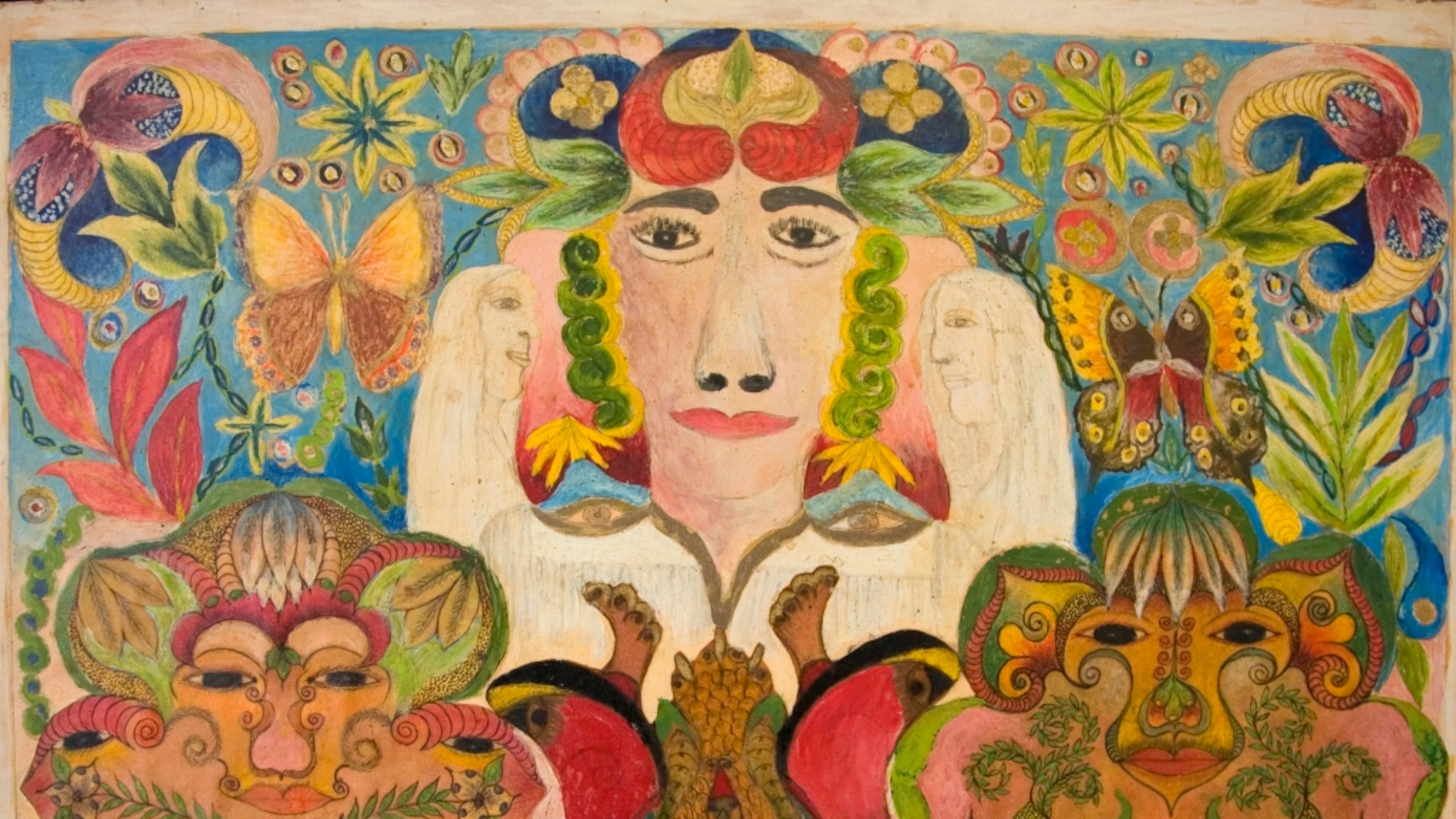 Untitled (Face Flanked by Angels and Mandalas Collage), 1946–1968, pencil, ink, crayon, and oil on paperboard, by Minnie Evans. (Courtesy of High Museum of Art)