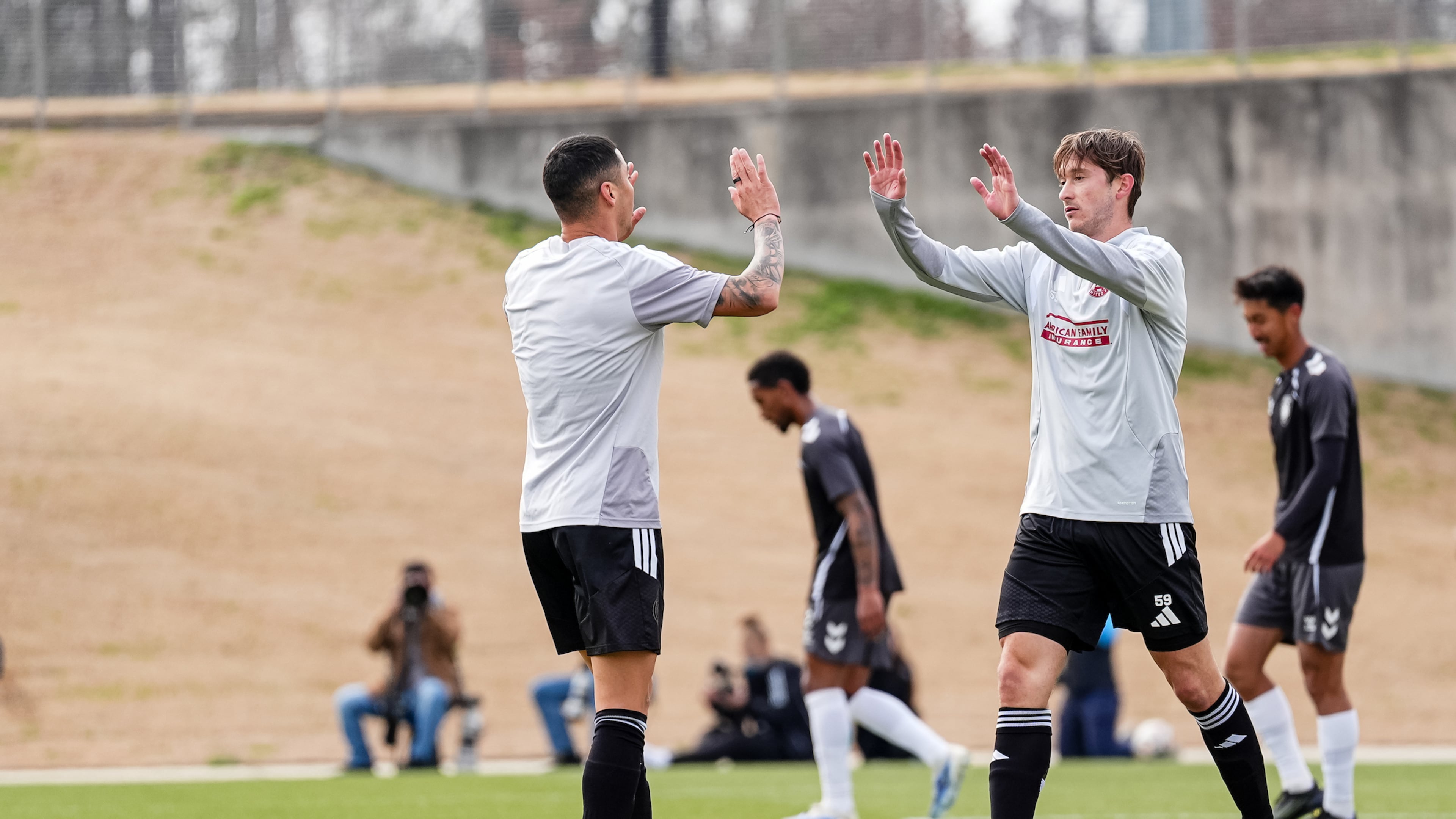 Atlanta United midfielder Alexey Miranchuk (right) celebrates after scoring a goal during the preseason match against Lexington Sporting Club at Children’s Healthcare of Atlanta Training Ground in Marietta, on Friday, January 30, 2026. (Matthew Dingle/Atlanta United)