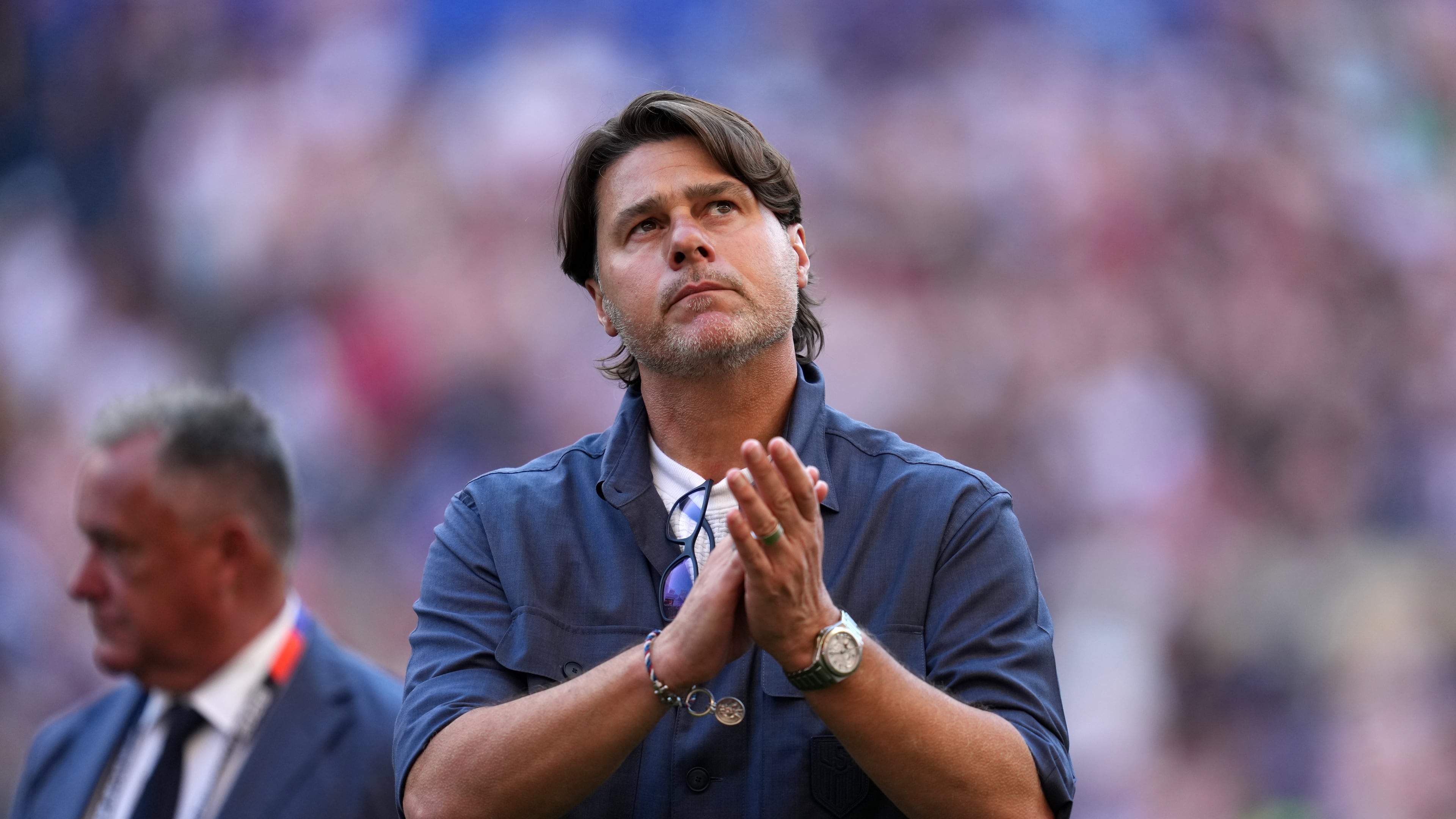 FILE - United States head coach Mauricio Pochettino walks off the field after the United States lost a World Cup round of 16 soccer match against Belgium in Seattle, July 6, 2026. (AP Photo/Abbie Parr, File)
