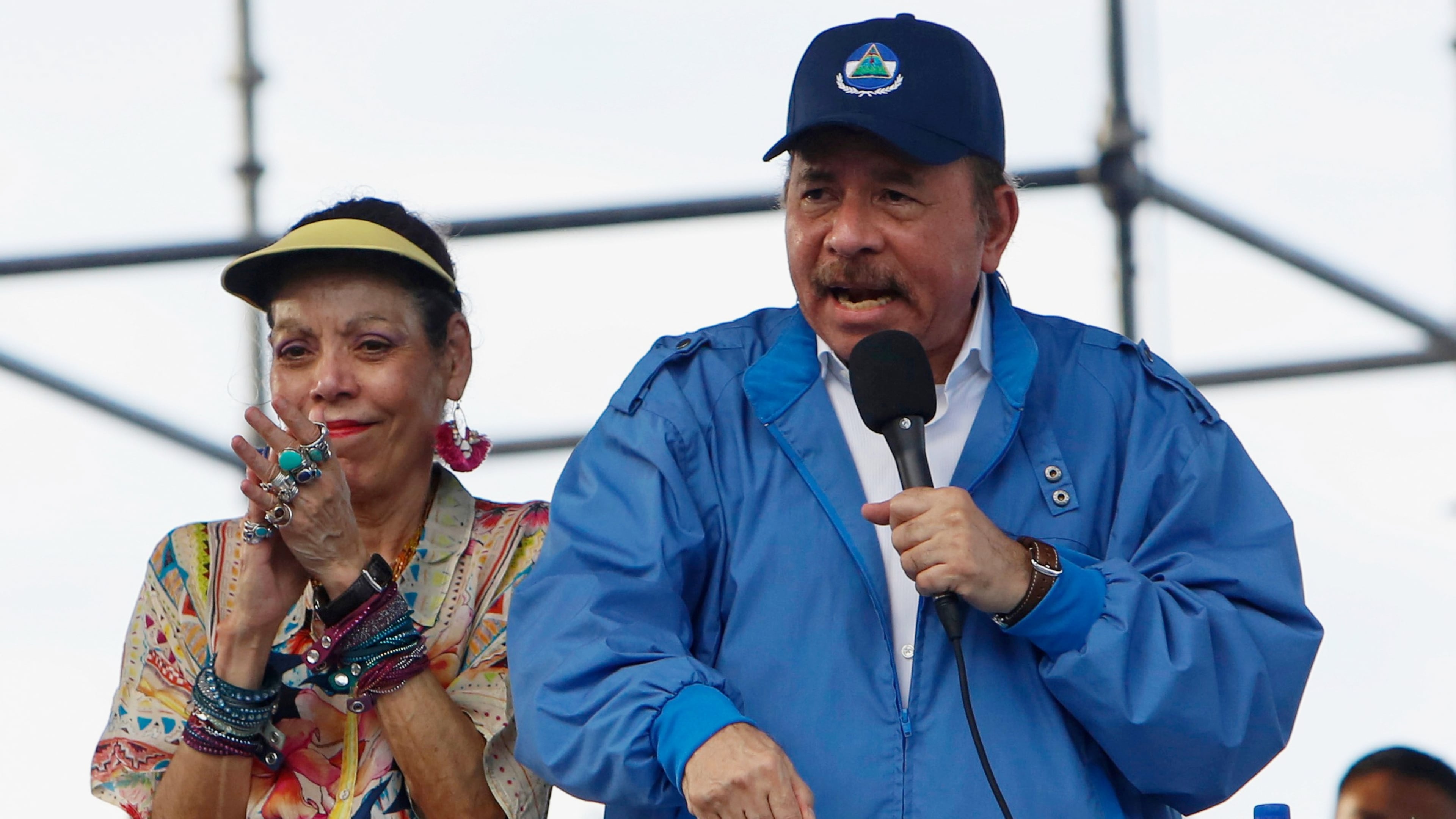 FILE - Nicaragua's President Daniel Ortega speaks to supporters as his wife and Vice President Rosario Murillo applauds, in Managua, Nicaragua, Aug. 29, 2018. (AP Photo/Alfredo Zuniga, File)