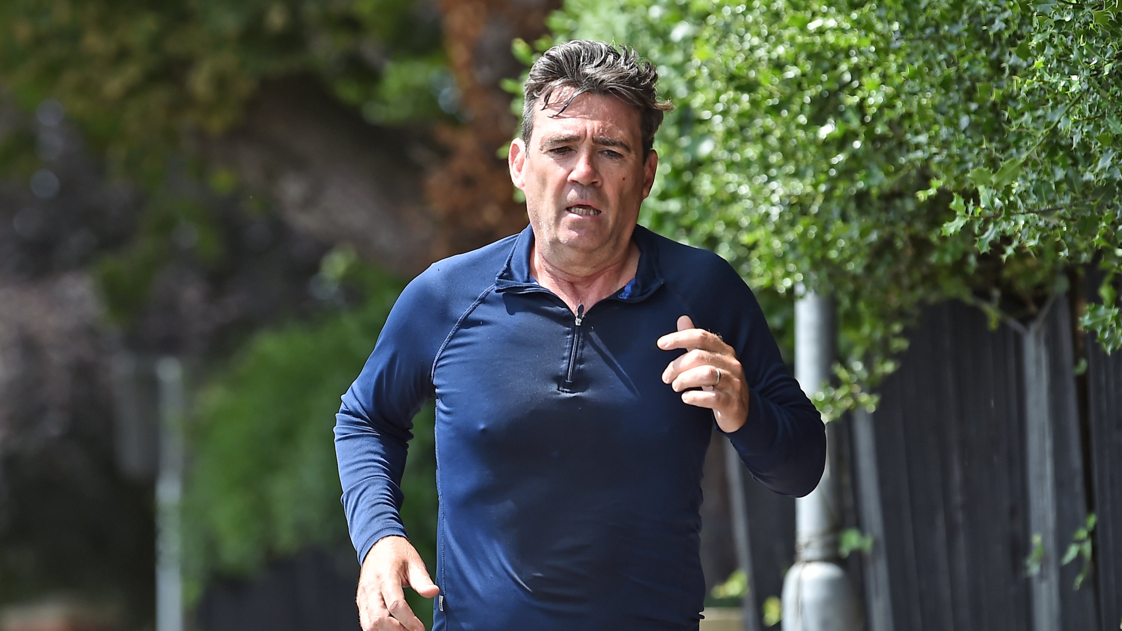 Andy Burnham running near his house in Cheshire, England, Sunday, June 28, 2026. (Peter Powell/PA via AP)