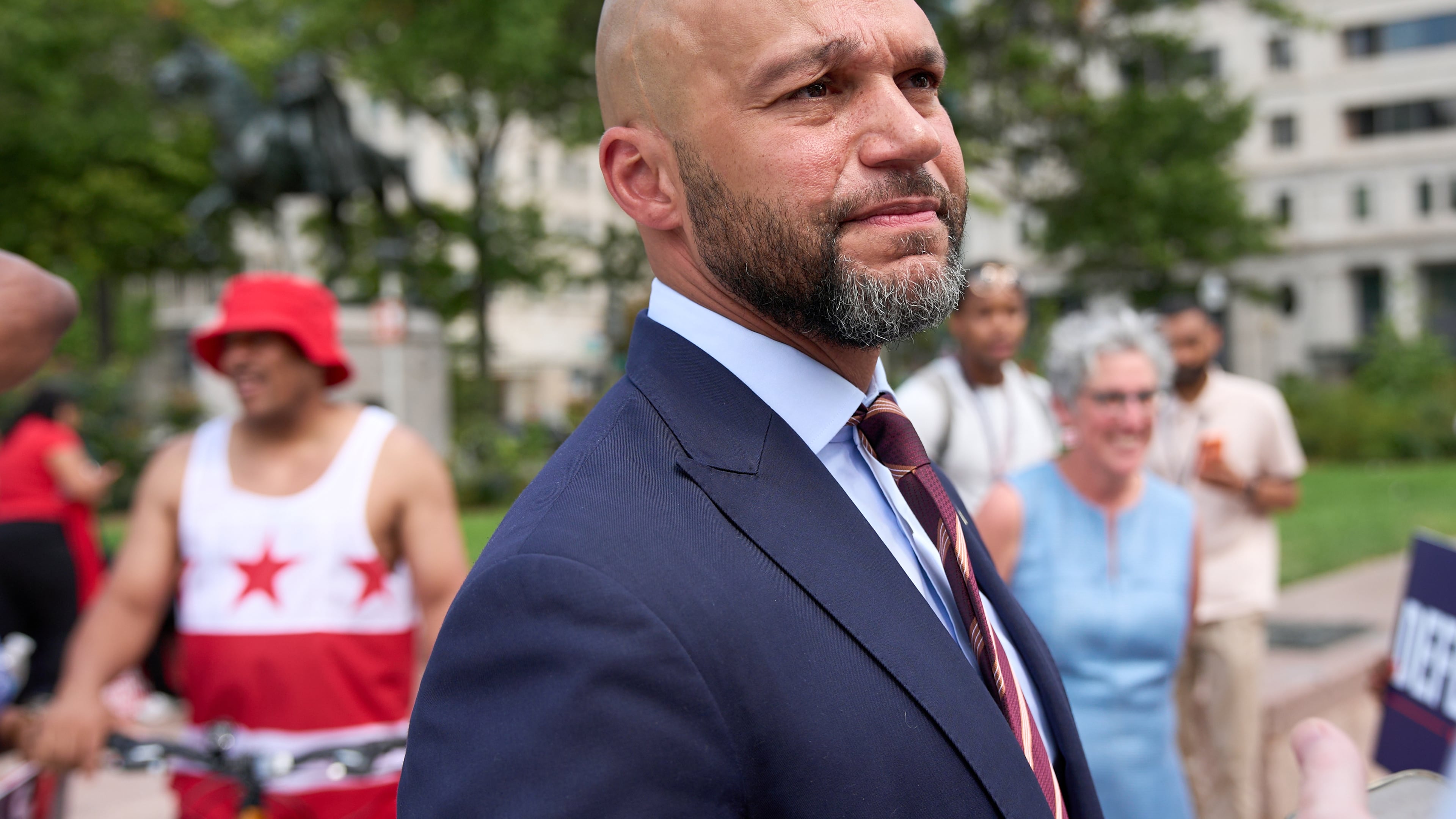 Congressional delegate candidate Robert White greets supporters after attending a news conference at Freedom Plaza in Washington, Monday, Aug. 24, 2026. (AP Photo/Jacquelyn Martin)