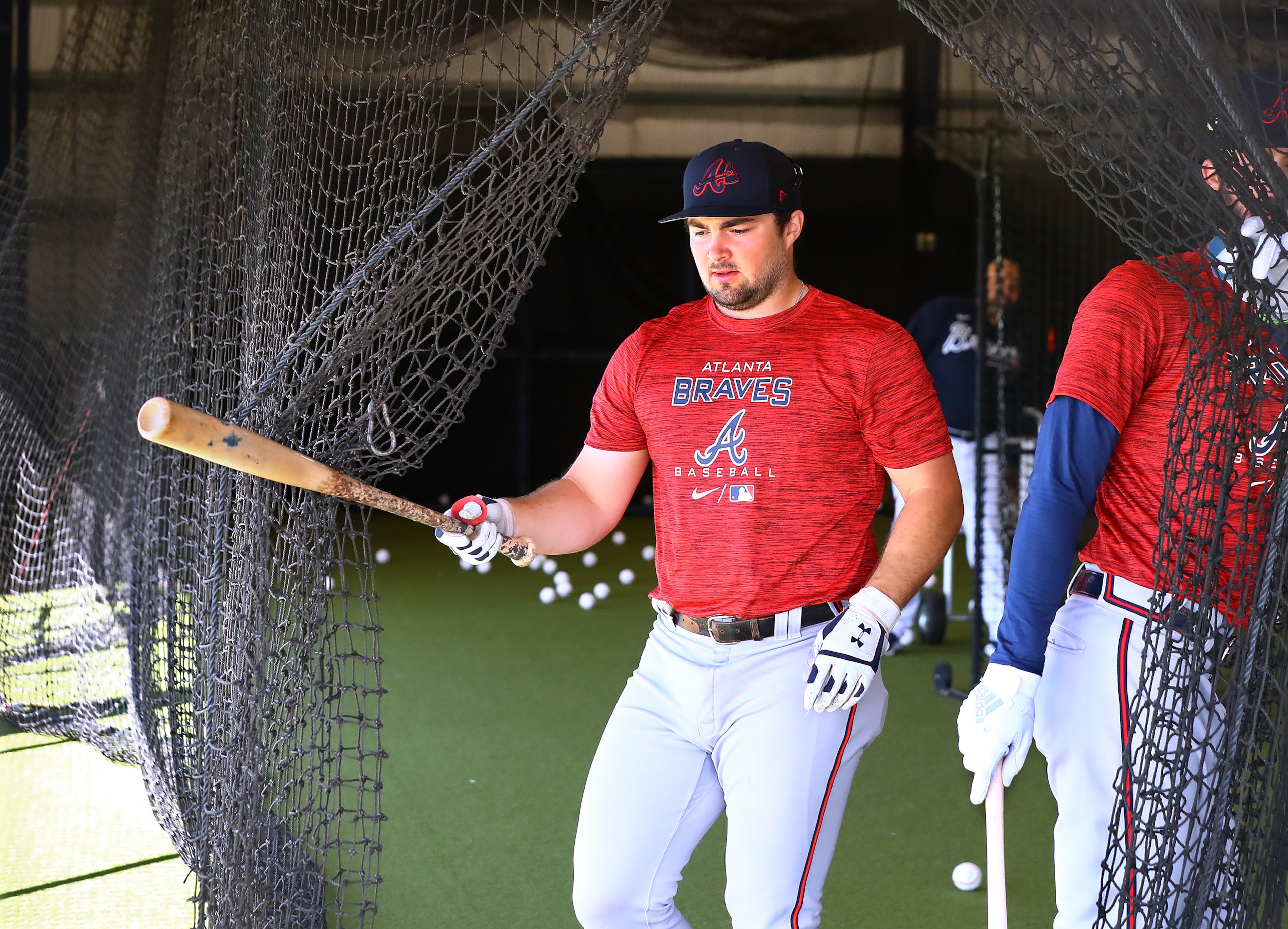 030622 North Port: Atlanta Braves top prospect catcher Shea Langeliers gets in some work in the batting cages on the first day of Braves minor league spring training camp on Sunday, March 6, 2022, in North Port. “Curtis Compton / Curtis.Compton@ajc.com”`