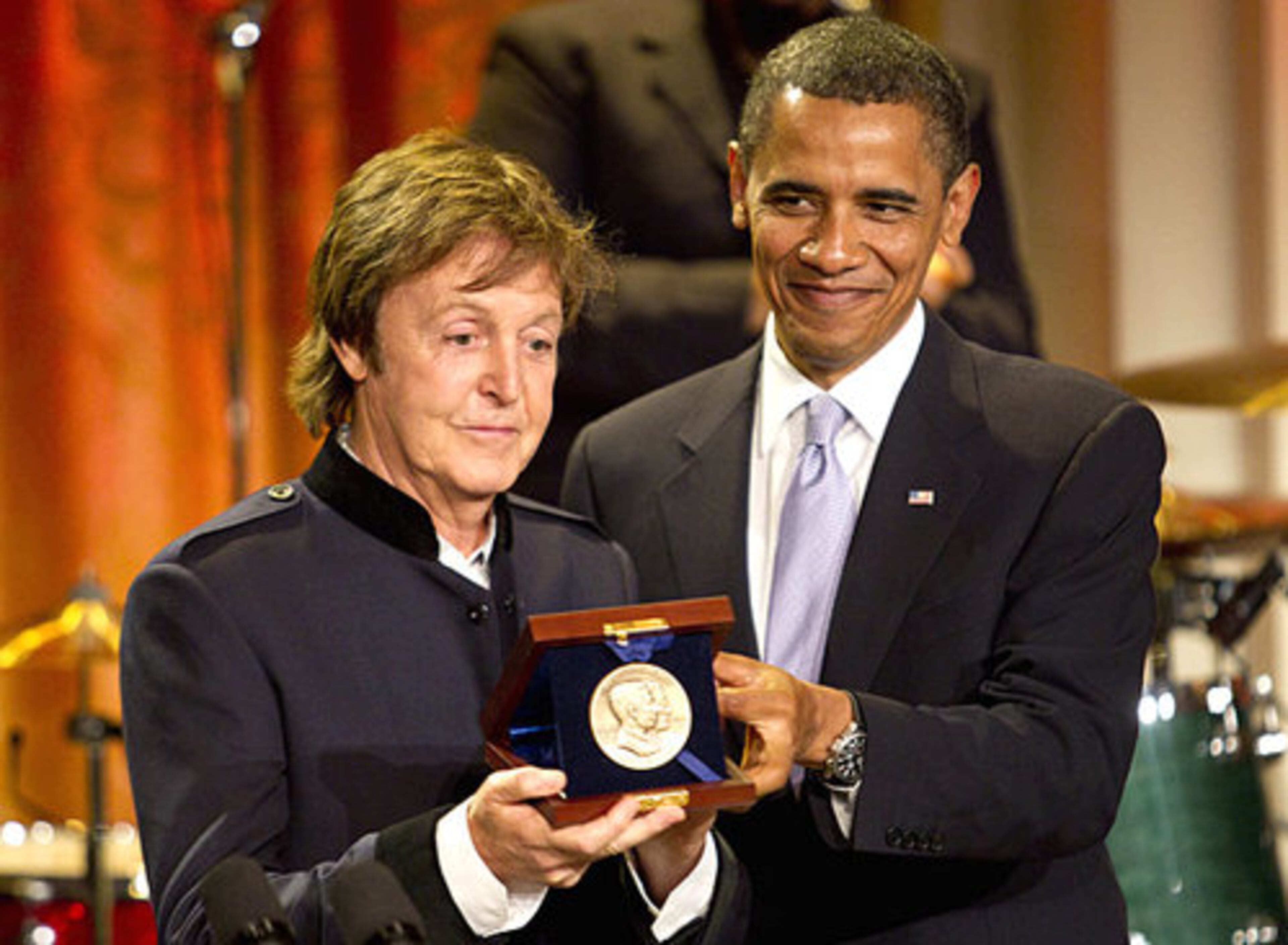 President Barack Obama presents McCartney the Gershwin Prize for Popular Song. The prize is awarded by the Library of Congress.