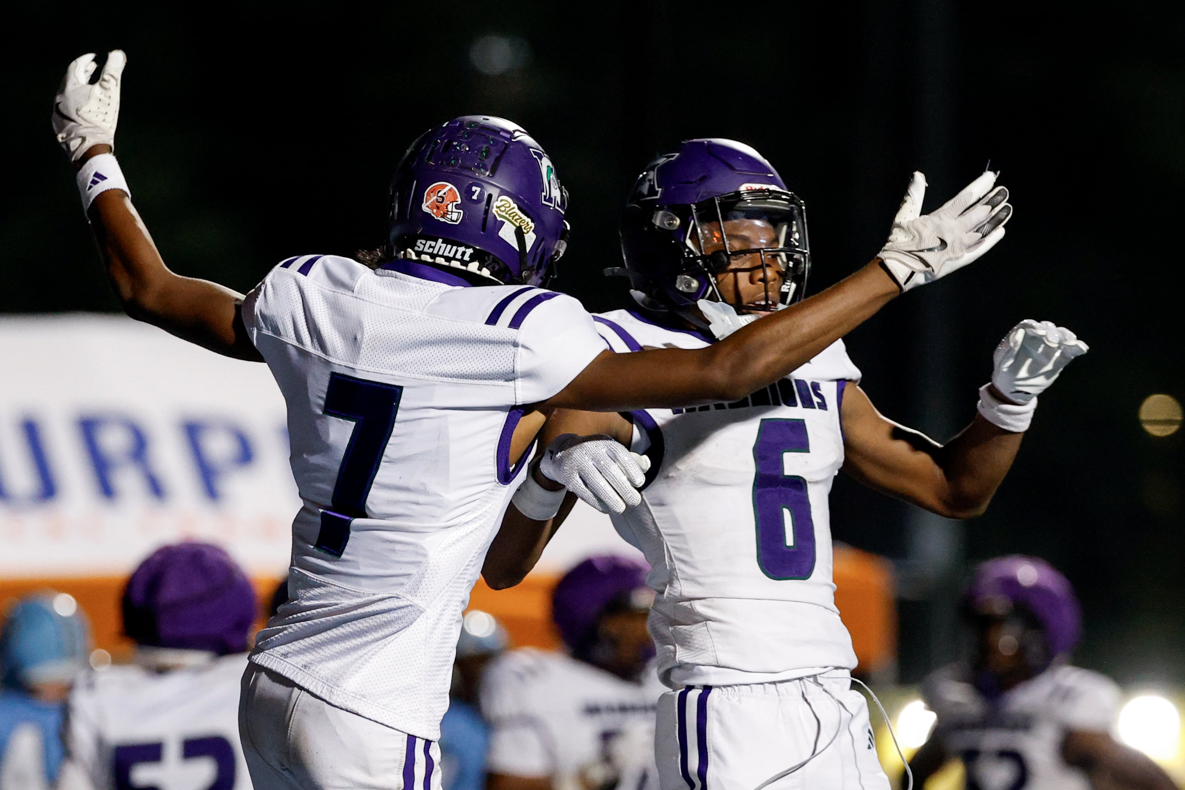 KIPP Atlanta’s Malachi Heard (right) celebrates his touchdown against North Cobb Christian with Tyree Harris on Friday, Oct. 2, 2026, in Kennesaw. (Erik S. Lesser for the AJC)