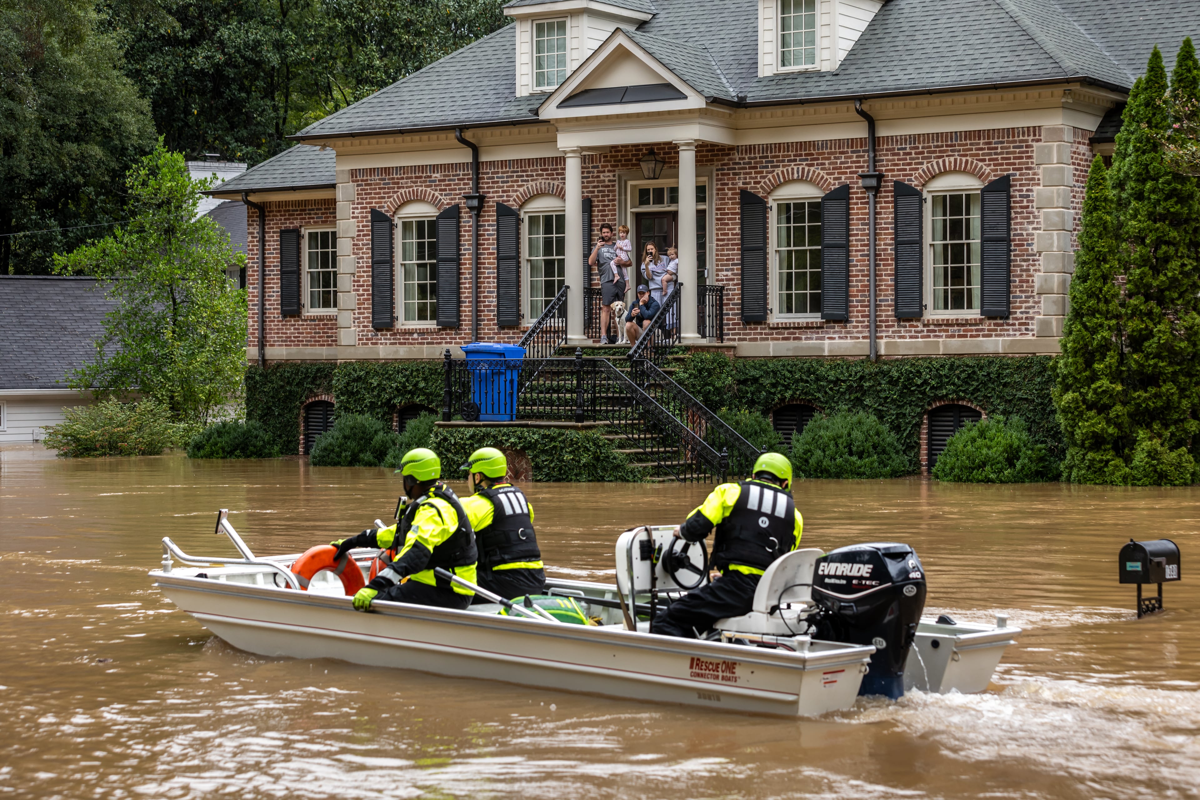 An Atlanta rescue squad performed welfare checks on residents on Hanover West Drive after flooding in 2024.