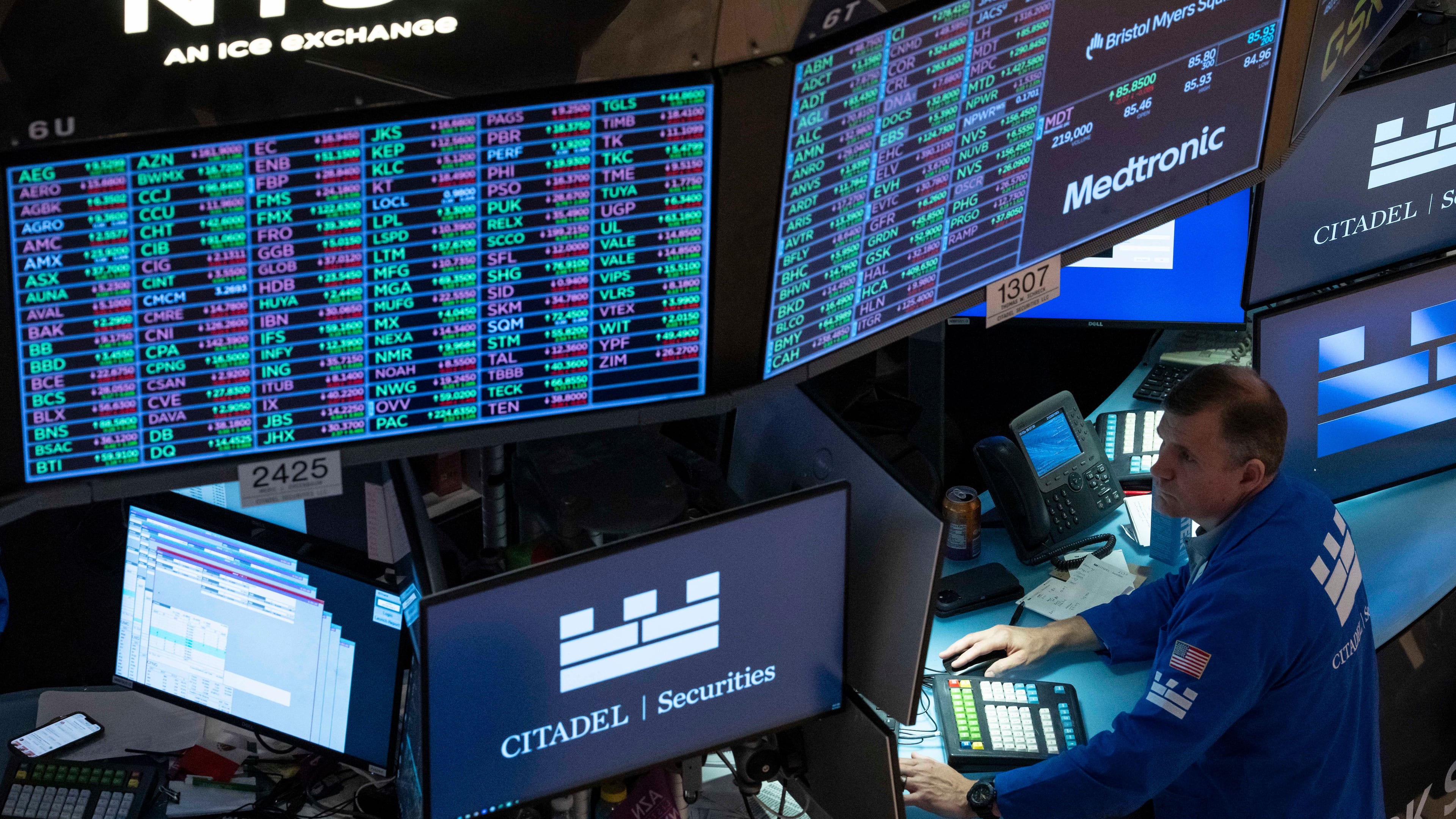 A screen shows stock prices on the floor of the New York Stock Exchange, Friday, Aug. 7, 2026, in New York. (AP Photo/Yuki Iwamura)