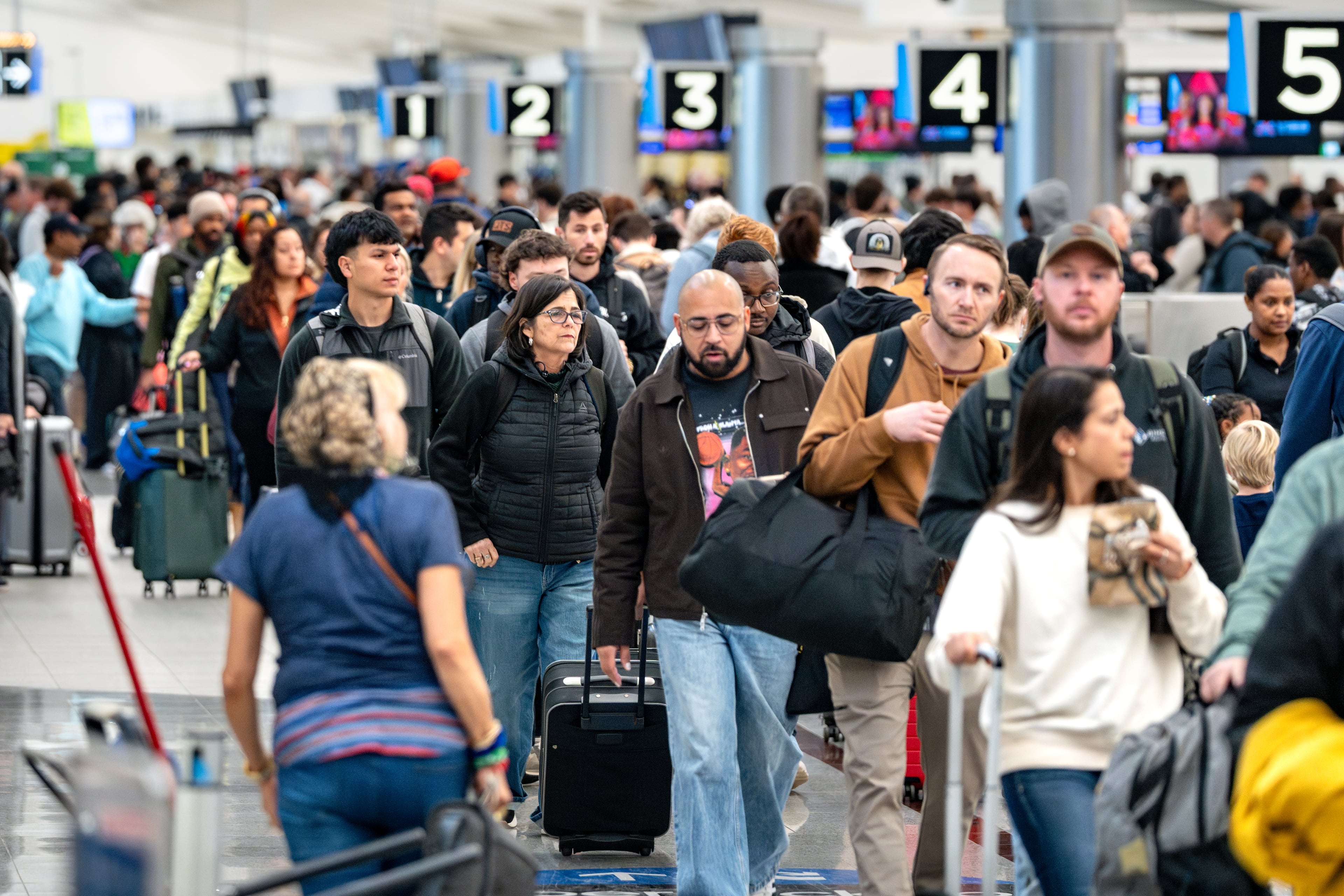 Long lines plagued morning travelers at Hartsfield-Jackson Atlanta International Airport amid the ongoing partial government shutdown on Tuesday, March 17, 2026. (Ben Hendren for the AJC)
