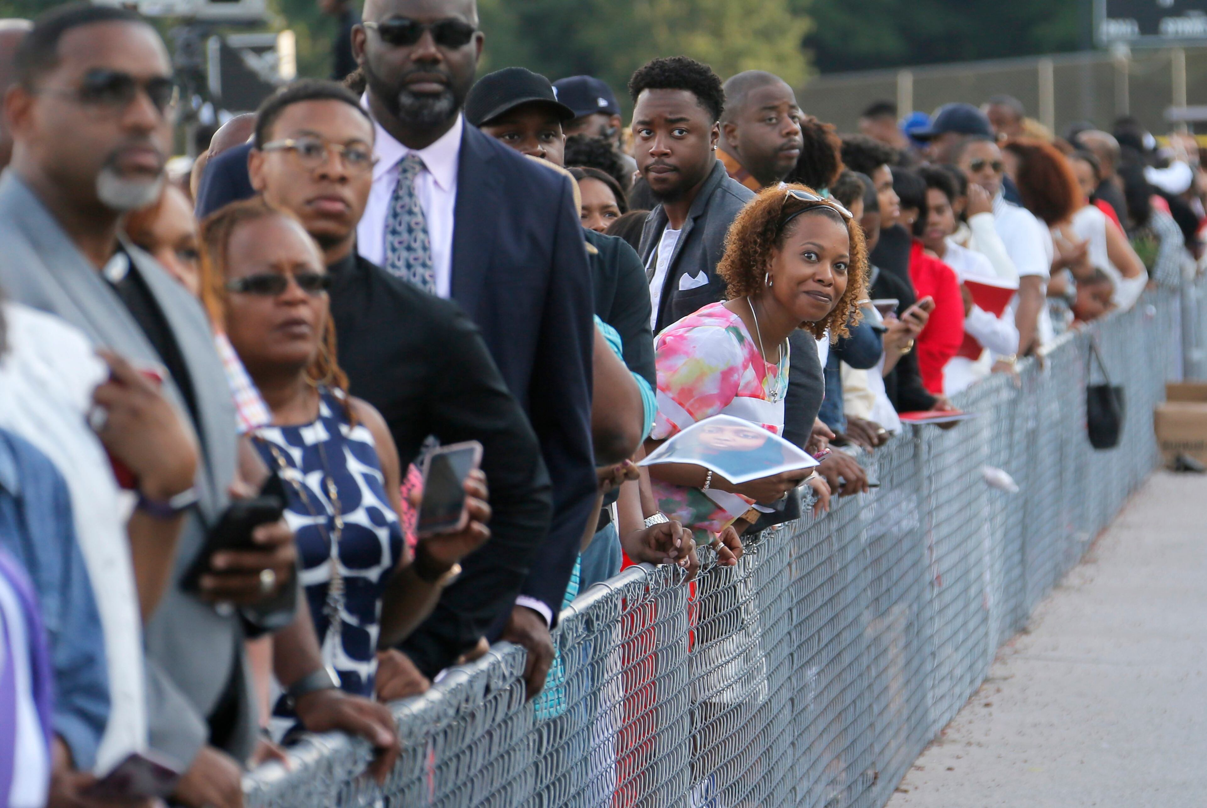 5/22/17 - Atlanta - Family members look for the Processional to begin. Clark Atlanta University's Panther Stadium was the site of their 28th annual Commencement. Businessman William Pickard gave the commencement address. Rev. Jesse Jackson, who received an honorary degree, also spoke. Panther Stadium, BOB ANDRES /BANDRES@AJC.COM