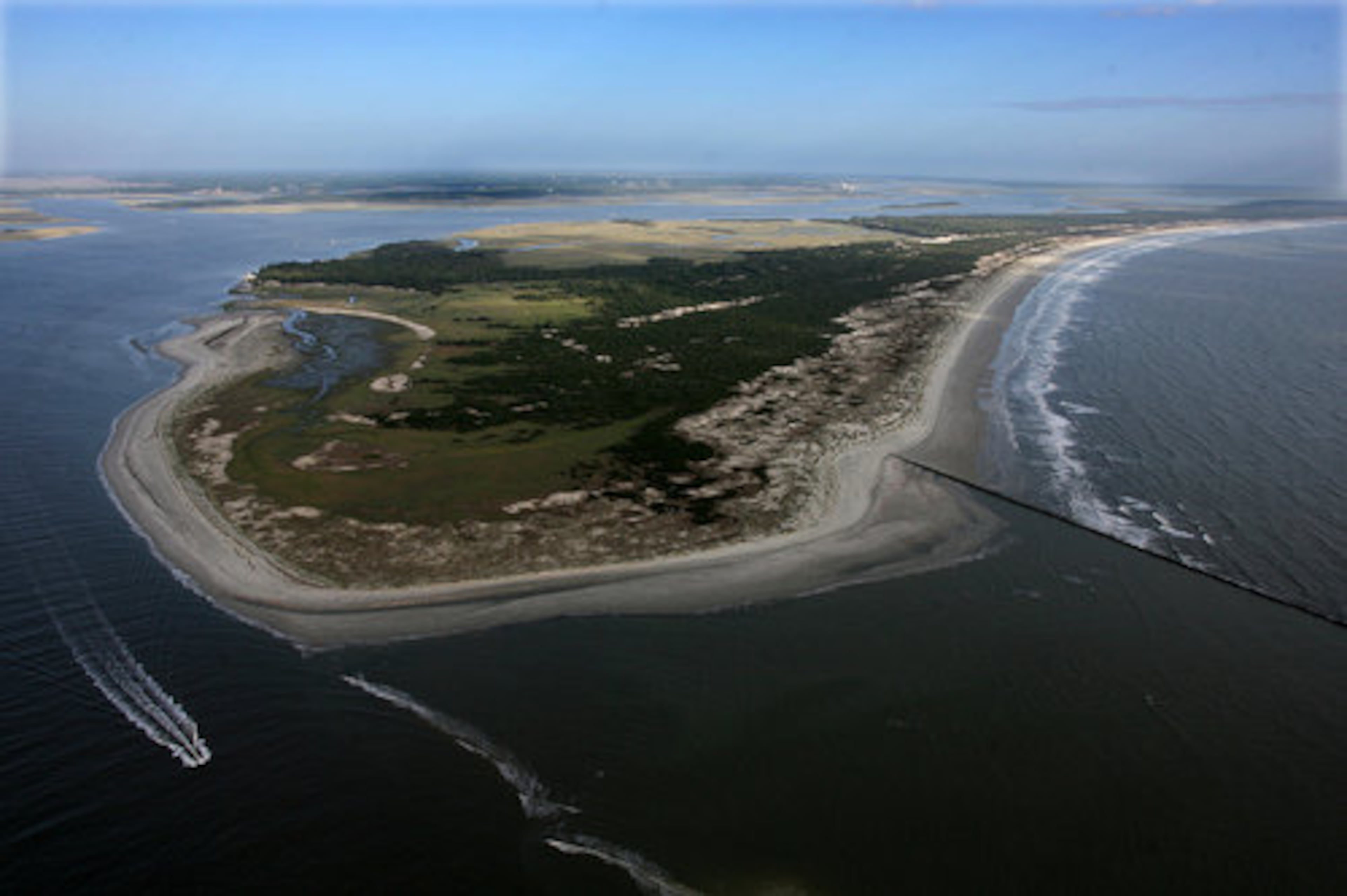 A boat navigates past the southern tip of Cumberland Island in Georgia as seen in this 2007 aerial photograph. (Curtis Compton/AJC file photo)
