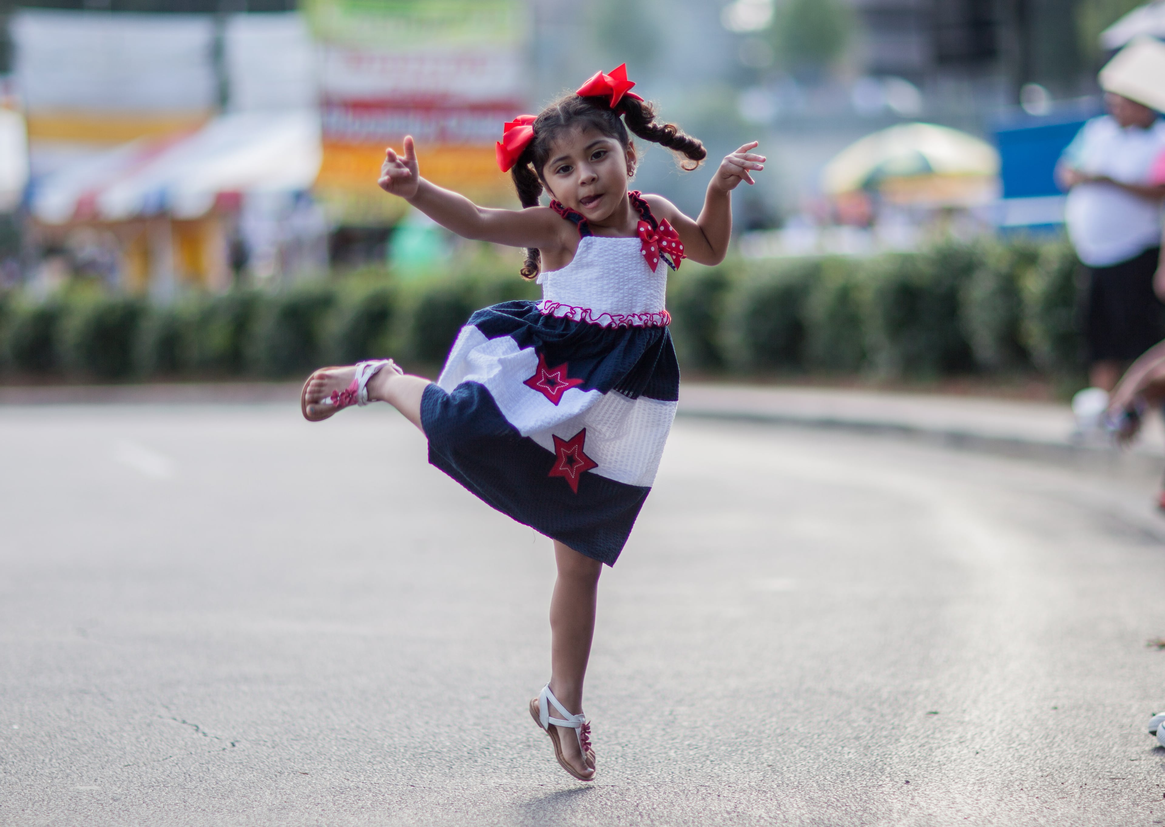 Valeria Diaz, 3, dances during the annual July 4th event at Lenox Square, Saturday, July 4, 2015, in Atlanta. Lenox Square held Atlanta's 56th Independence Day celebration and is the Southeast's largest firework show. BRANDEN CAMP/SPECIAL