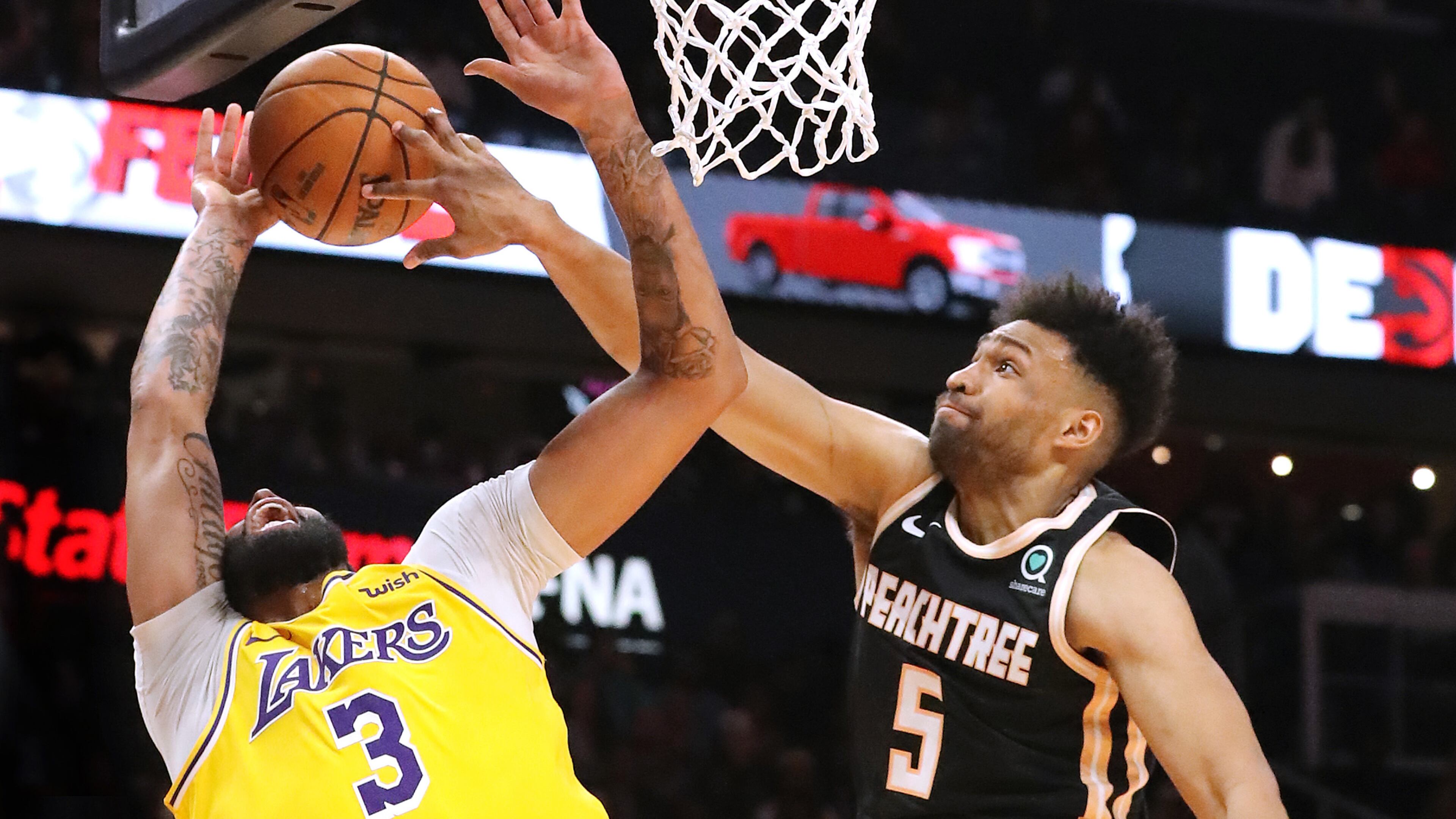 The Hawks Jabari Parker has a shining moment of defense, blocking the shot of the Los Angeles Lakers Anthony Davis.