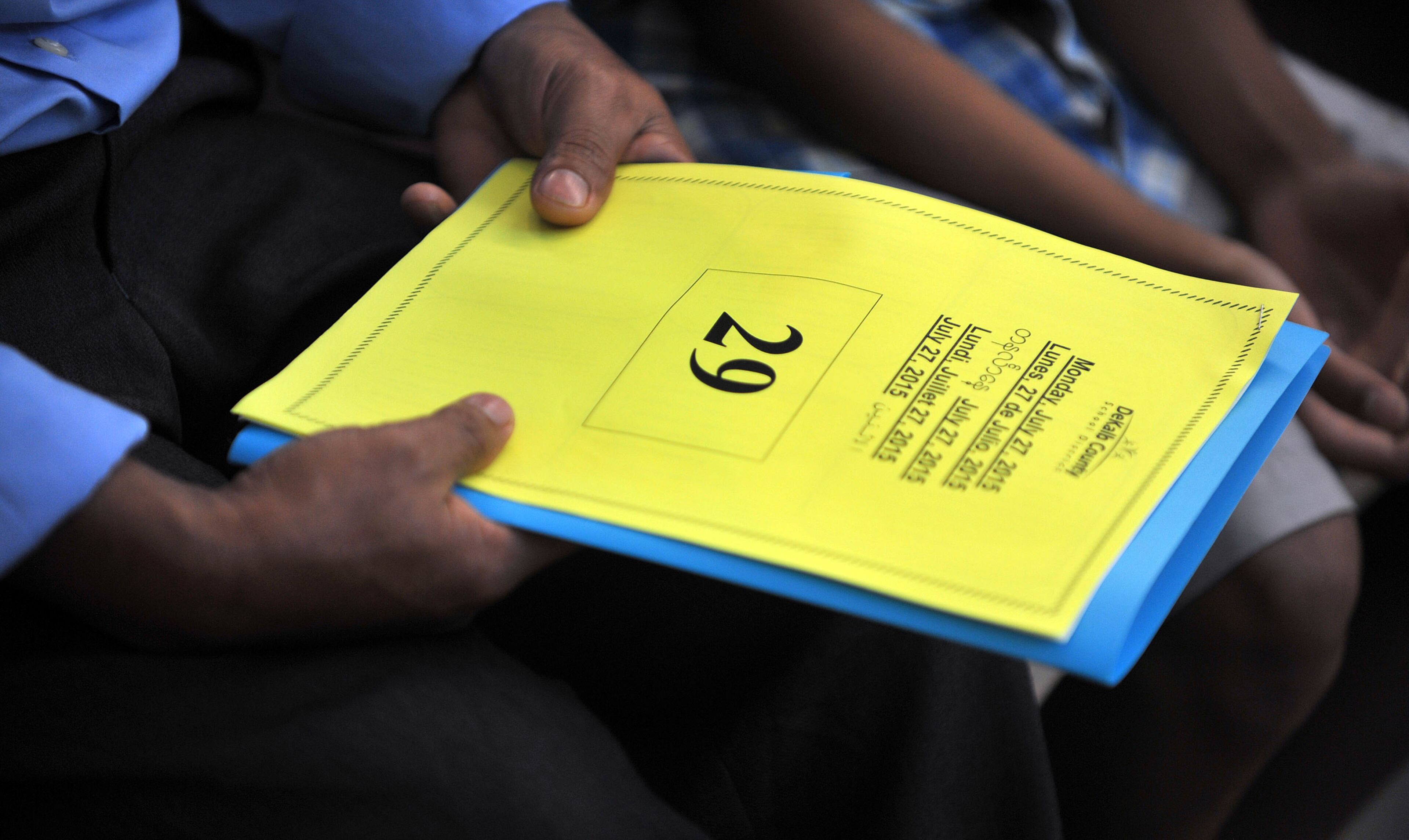 In August 2014, people camped outside a DeKalb school registration facility overnight, apparently because of a rumor that if they didn’t register by then their kids wouldn’t get into school. This is the sort of thing the district hopes to prevent this school year. -- Text contributed by Ty Tagami, AJC