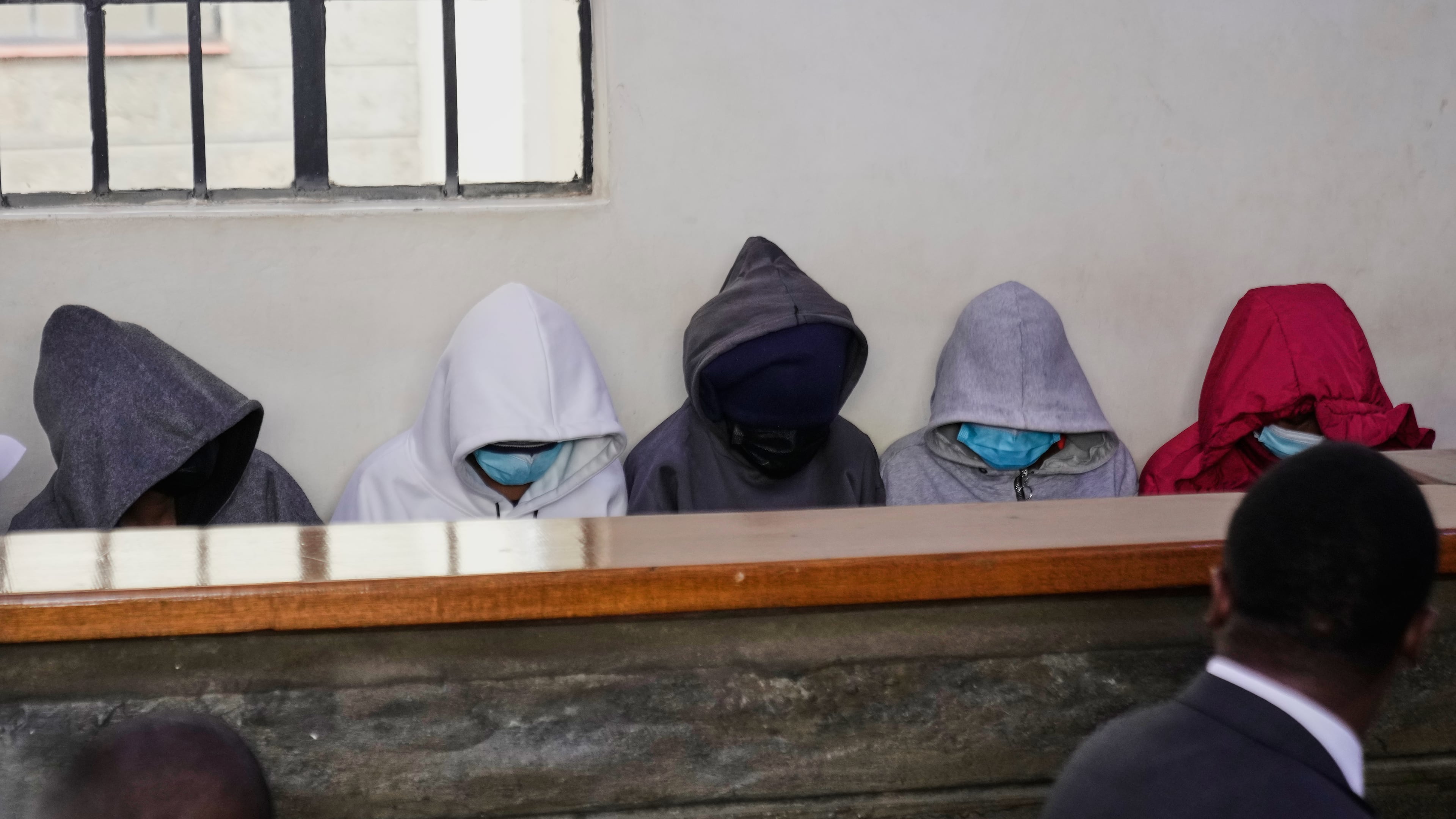 Students from Utumishi Girls Academy appear at Naivasha Law Courts in Nakuru, Kenya, Tuesday, June 2, 2026. (AP Photo/Brian Inganga)