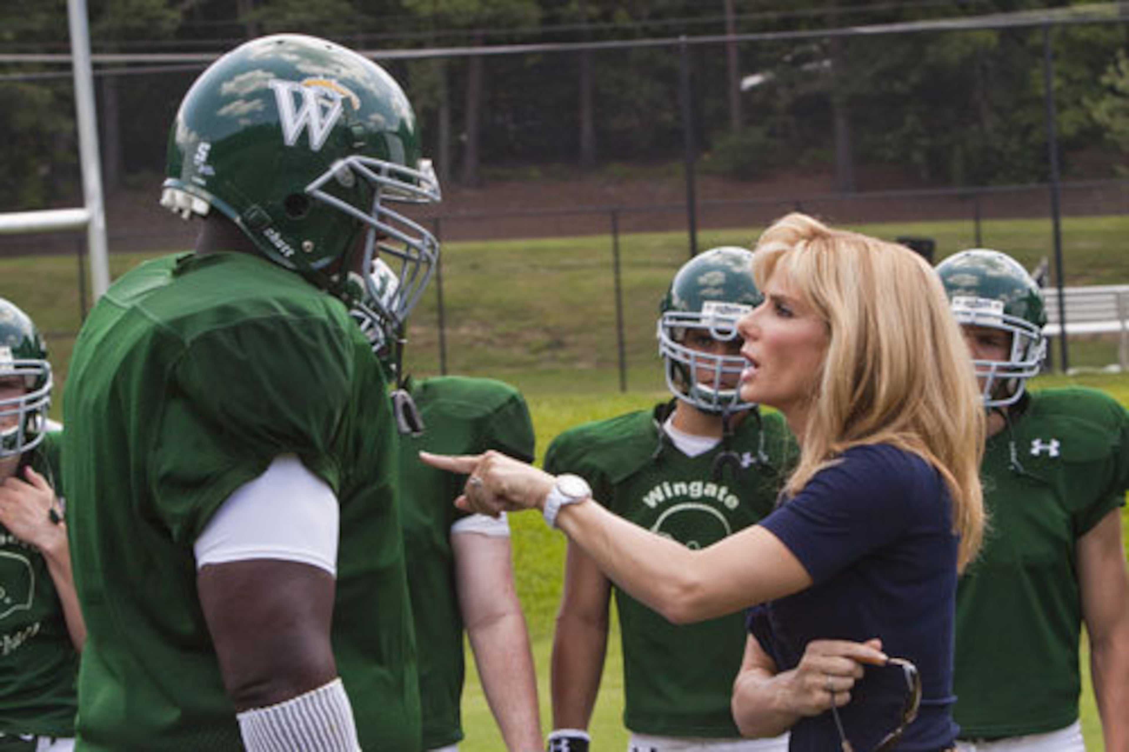 "The Blind Side" was based on the true story of troubled high school football phenom Michael Oher (Quinton Aaron, left). It also starred Sandra Bullock (right) and Tim McGraw and was shot in and around Atlanta in 2009. (AP FILE)