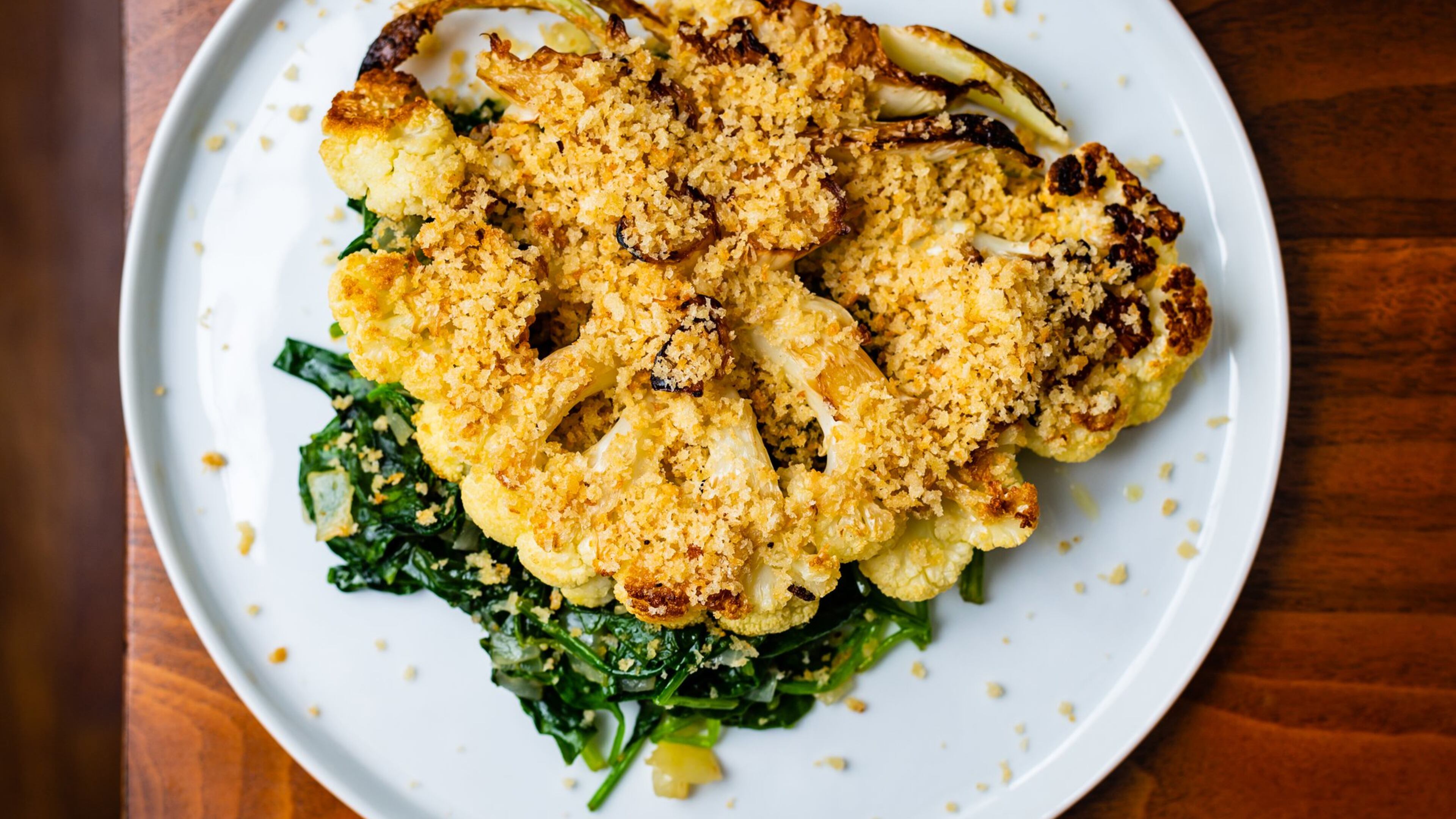 Quick Cauliflower Steaks with Sauteed Spinach. CONTRIBUTED BY HENRI HOLLIS