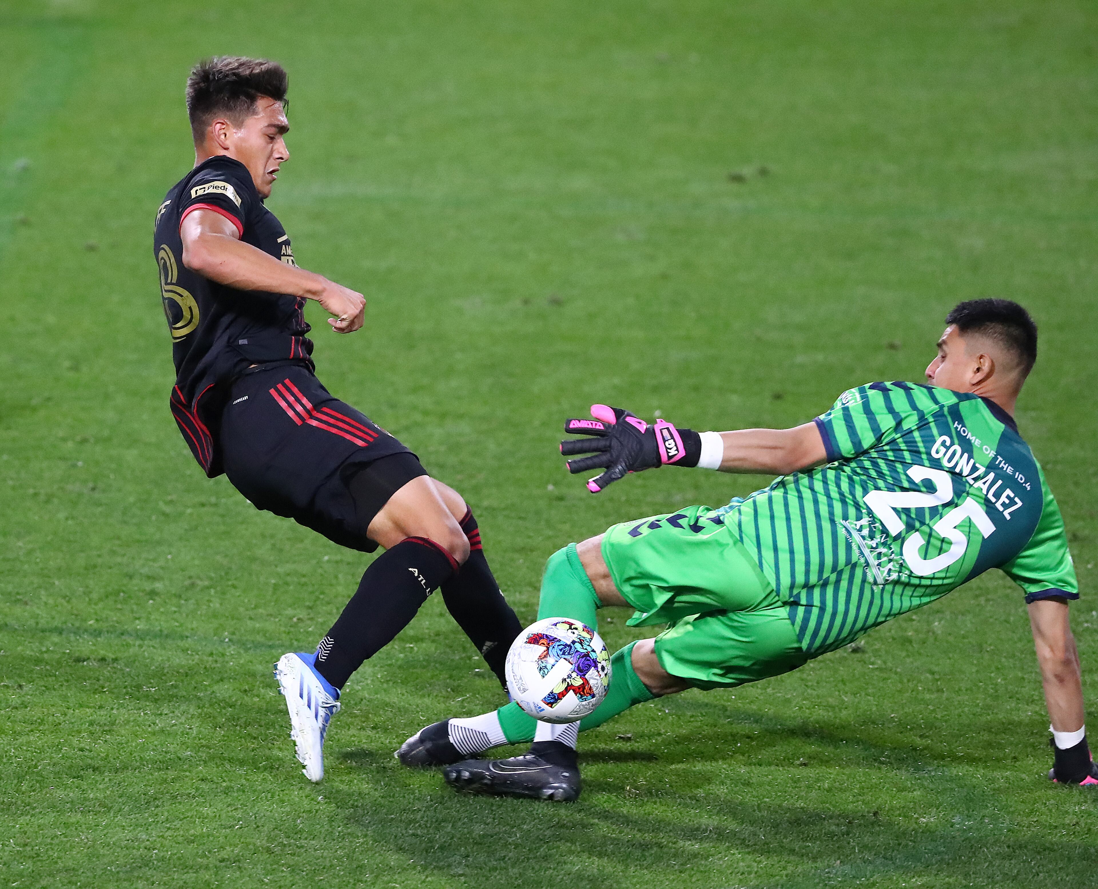 Atlanta United attacker Tyler Wolff his his shot blocked by Chattanooga FC goalkeeper Kevin Gonzalez in the Lamar Hunt U.S. Open Cup on Wednesday, April 20, 2022, in Kennesaw. “Curtis Compton / Curtis.Compton@ajc.com”