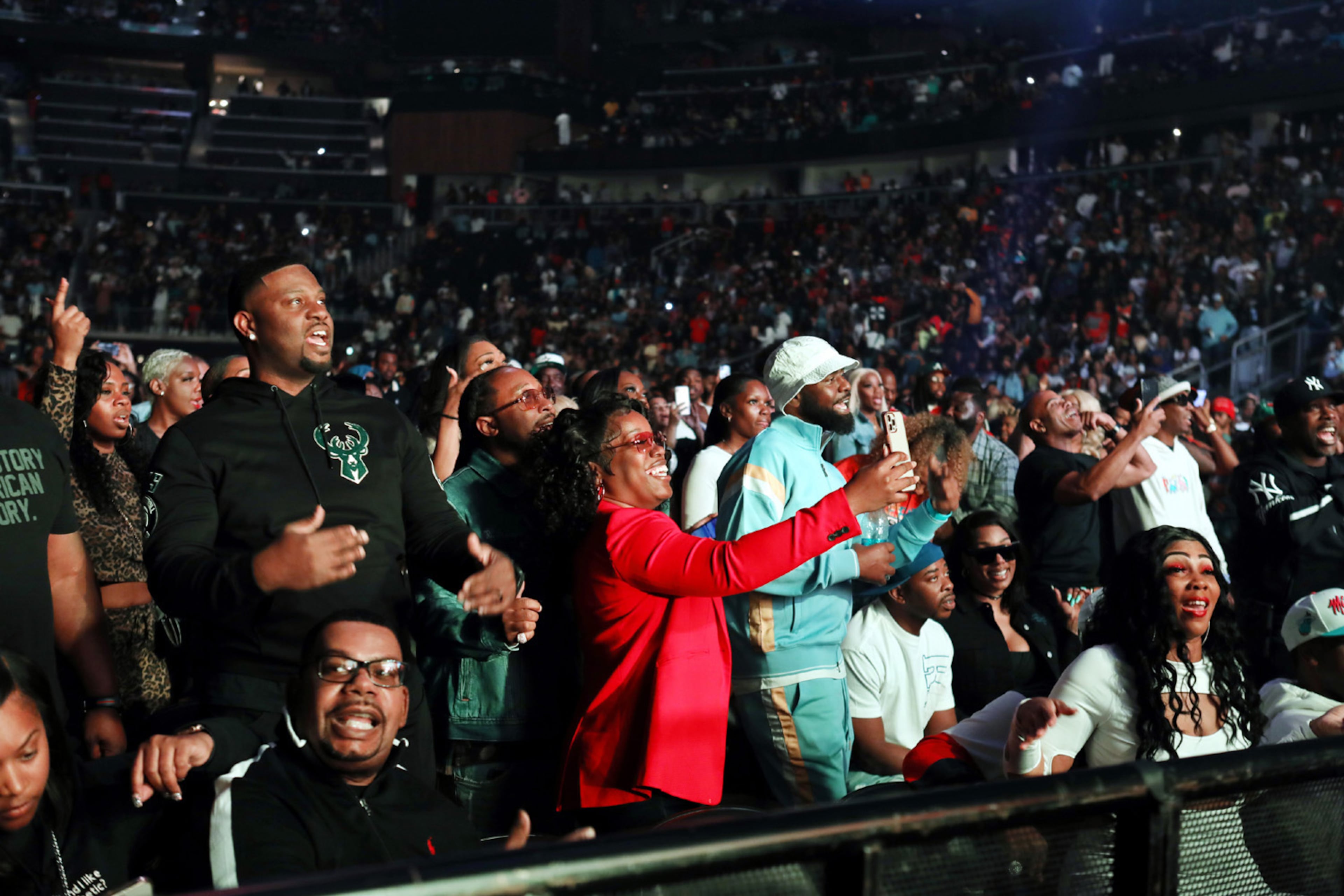 Fans enjoy the Legendz of the Streetz Tour at State Farm Arena in Atlanta on Friday, April 1, 2022. The sold-out show featured hip-hop stars Rick Ross, Jeezy, T.I., Trina, DJ Drama, Dav3D and D'Myke. (Photo: Robb Cohen for The Atlanta Journal-Constitution)