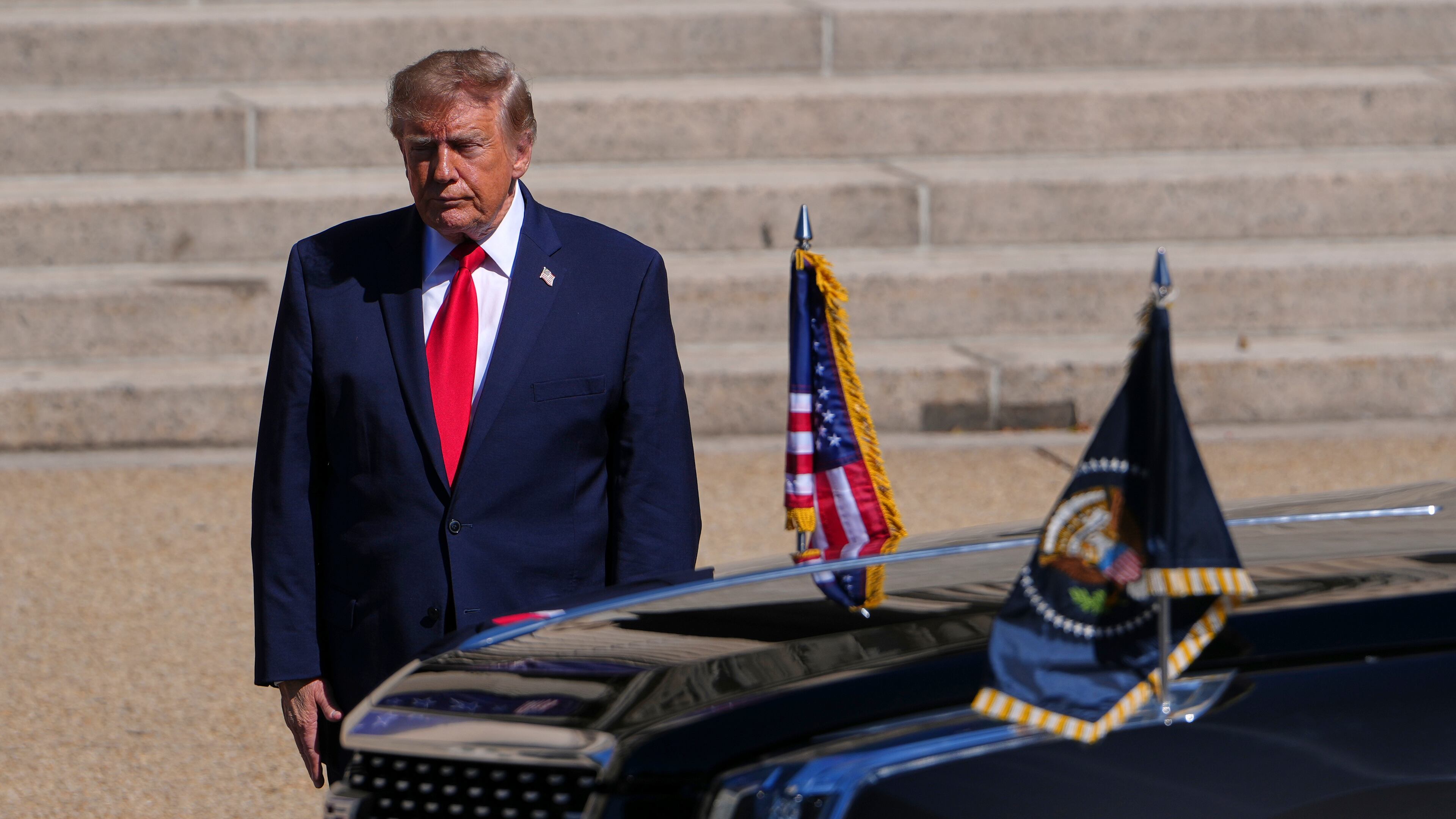 President Donald Trump arrives at the National Archives Museum to greet China's President Xi Jinping and his wife Peng Liyuan, Friday, Sept. 25, 2026, in Washington. (AP Photo/Julia Demaree Nikhinson)