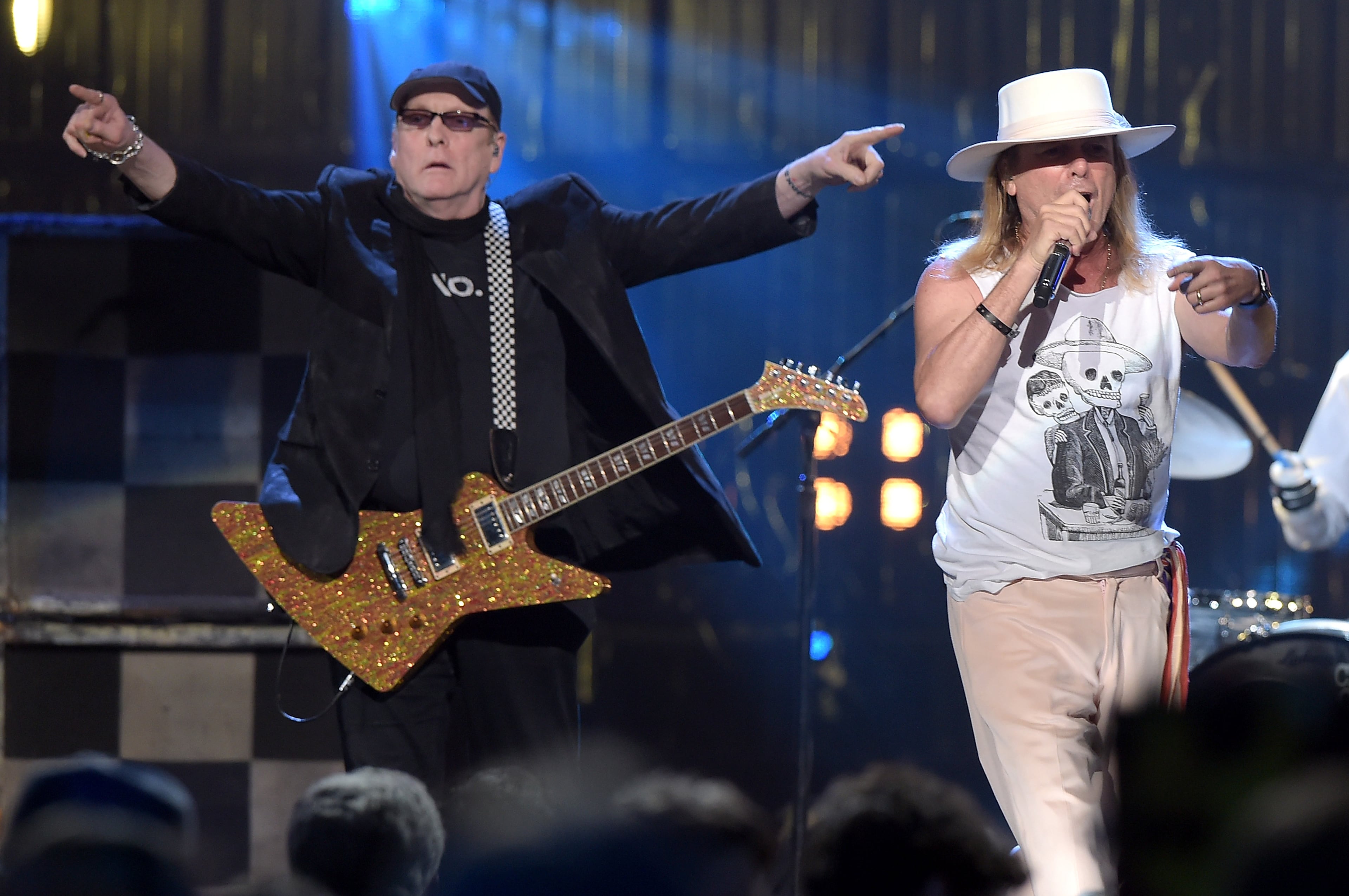NEW YORK, NEW YORK - APRIL 08: Inductee Rick Nielsen and Robin Zander of Cheap Trick perform onstage at the 31st Annual Rock And Roll Hall Of Fame Induction Ceremony at Barclays Center of Brooklyn on April 8, 2016 in New York City. (Photo by Theo Wargo/Getty Images)