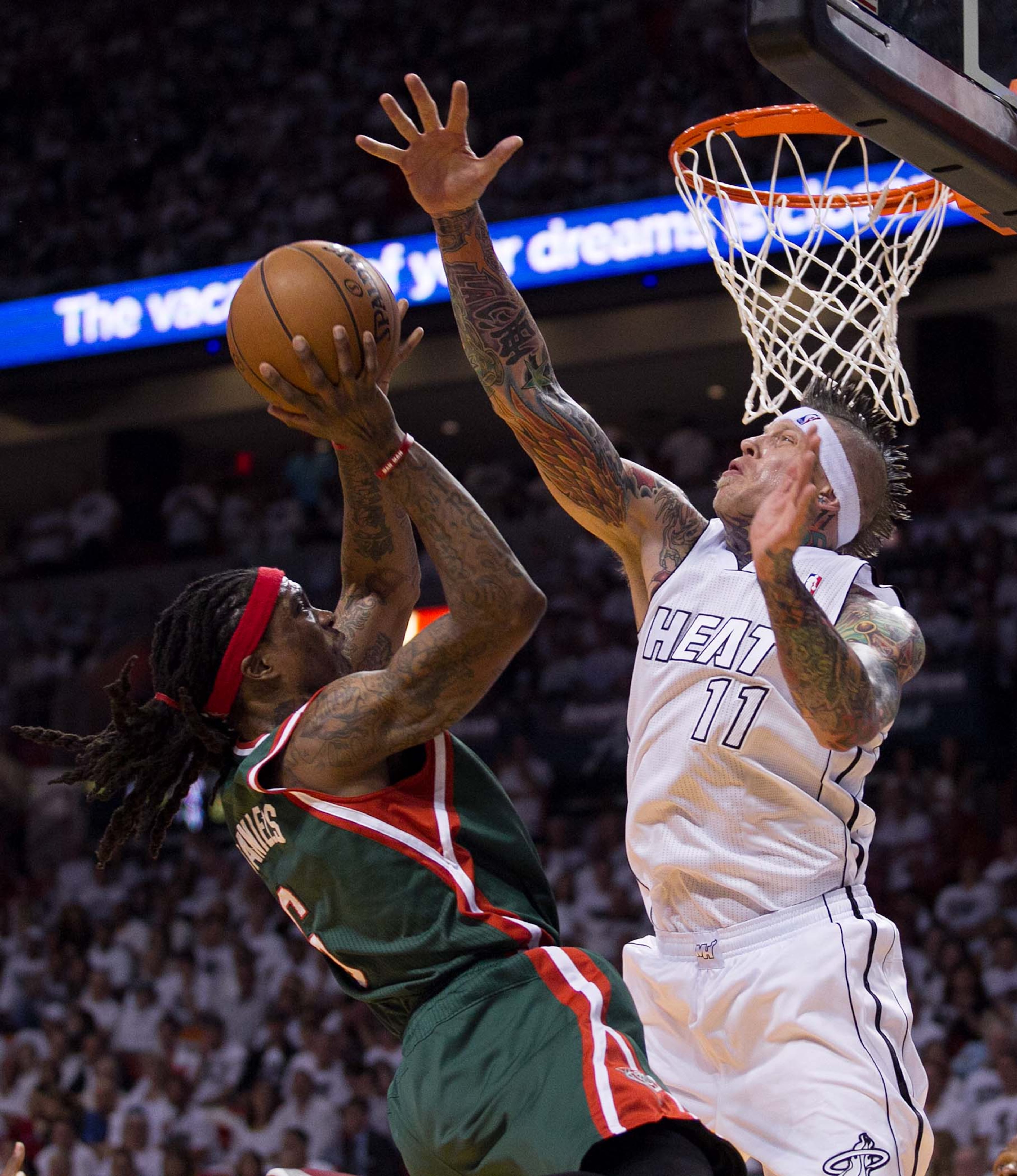 Miami Heat power forward Chris Andersen (11) blocks a shot by Milwaukee Bucks small forward Marquis Daniels (6) at AmericanAirlines Arena on April 21, 2013. (Allen Eyestone/The Palm Beach Post)