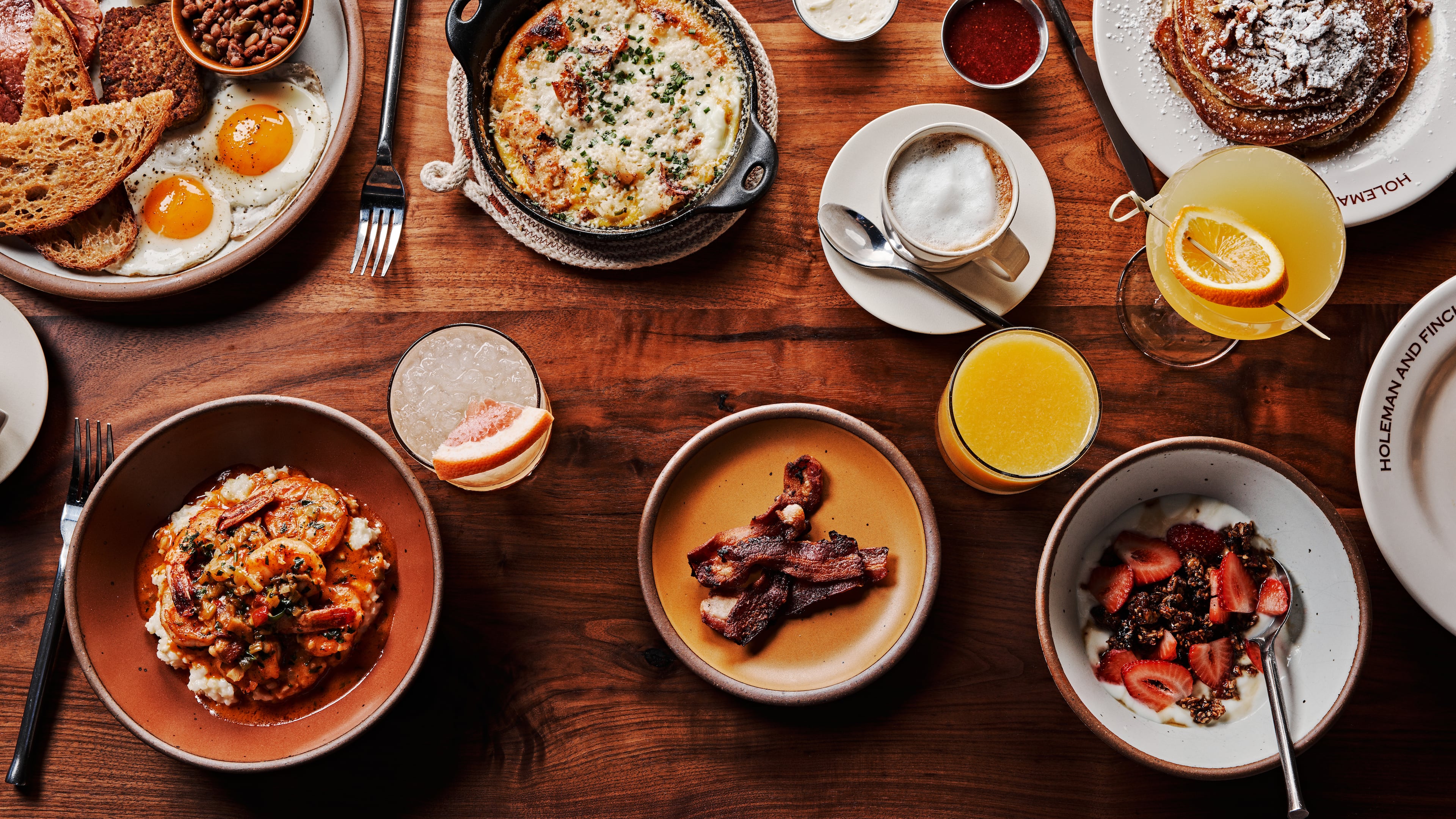 Dishes from the menu of Holeman & Finch. / Courtesy of Holeman & Finch