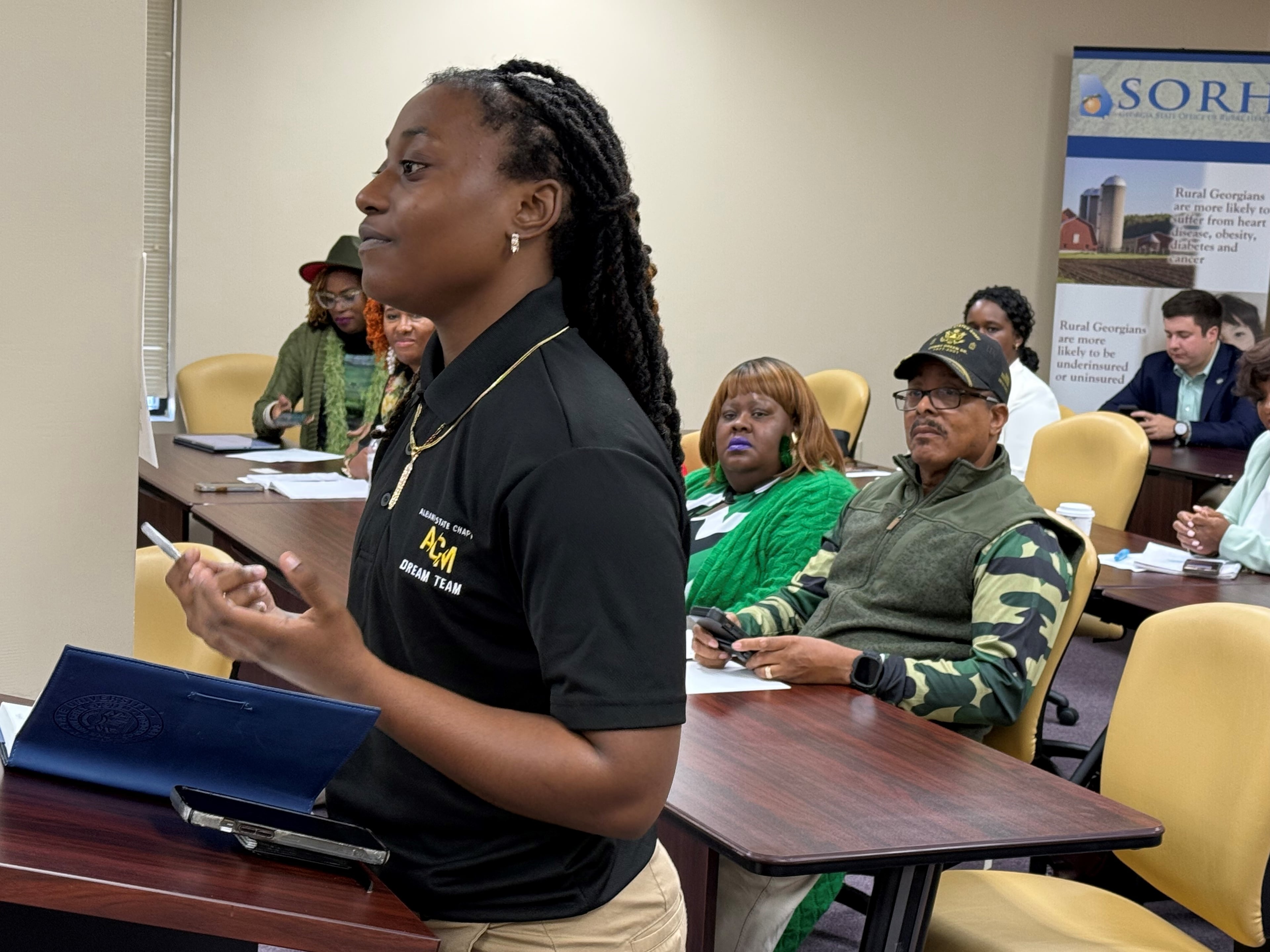 Shekniah Newby, 22, spoke to Georgia Department of Community Health leaders at a public hearing in Cordele, Georgia on Gov. Brian Kemp's Pathways to Coverage. Pathways is a Medicaid program for active uninsured adults. Newby advocated for more in-person local outreach about Pathways, and for help through the complex application process. Newby said when she was an uninsured college student she didn't know about Pathways or that college attendance could make her qualified for it. The hearing was held on March 17, 2025. (Photo by Ariel Hart / ahart@ajc.com)