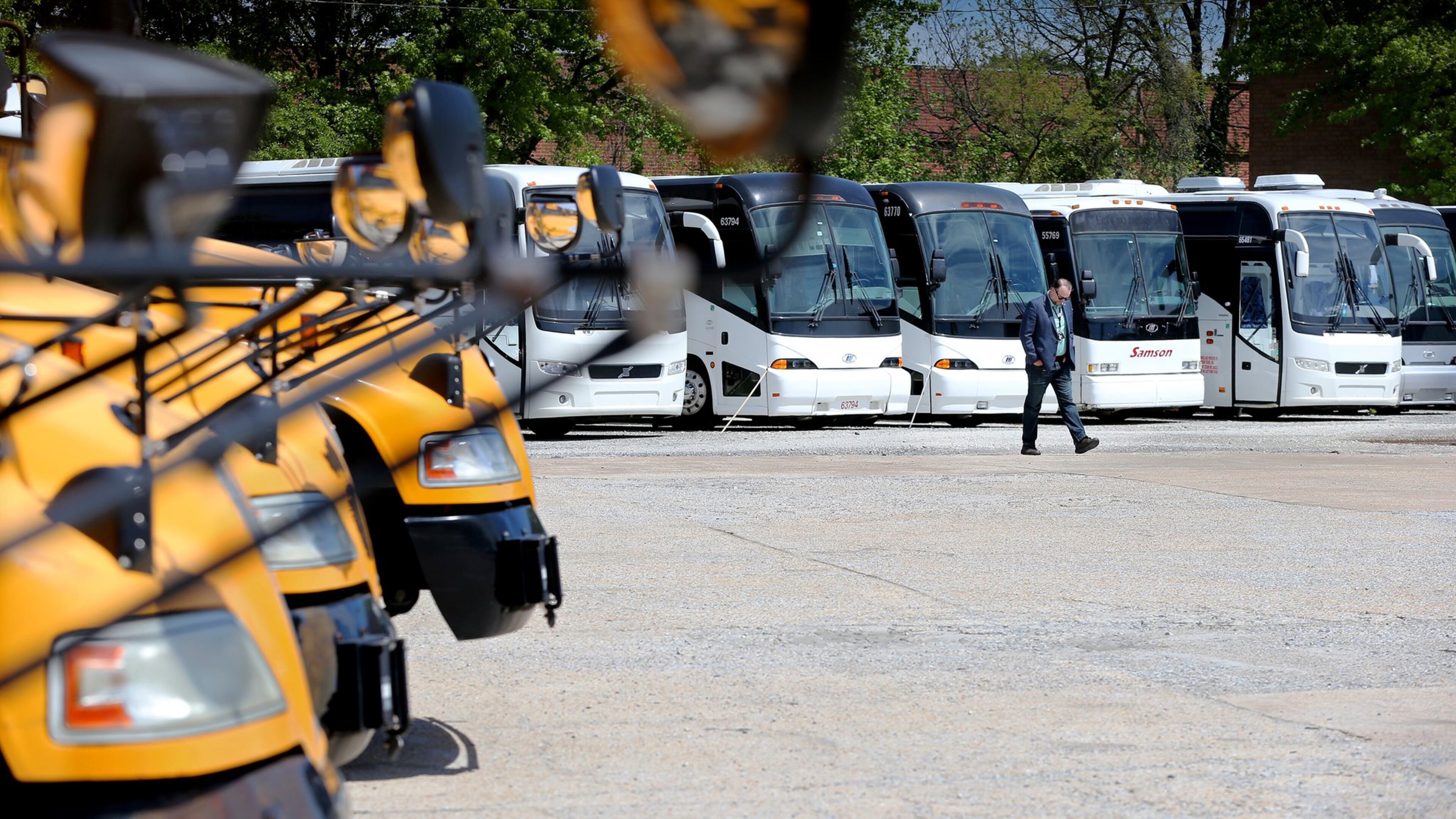 Tom Sambdman, co-owner of Samson Tours whose coaches and school buses sit idle, is waiting for federal relief loans and trying to decide how to use them on Wednesday, April 15, 2020, in Atlanta. The company wants to pay their staff of 72 employees but has no work for them until the summer. Curtis Compton ccompton@ajc.com