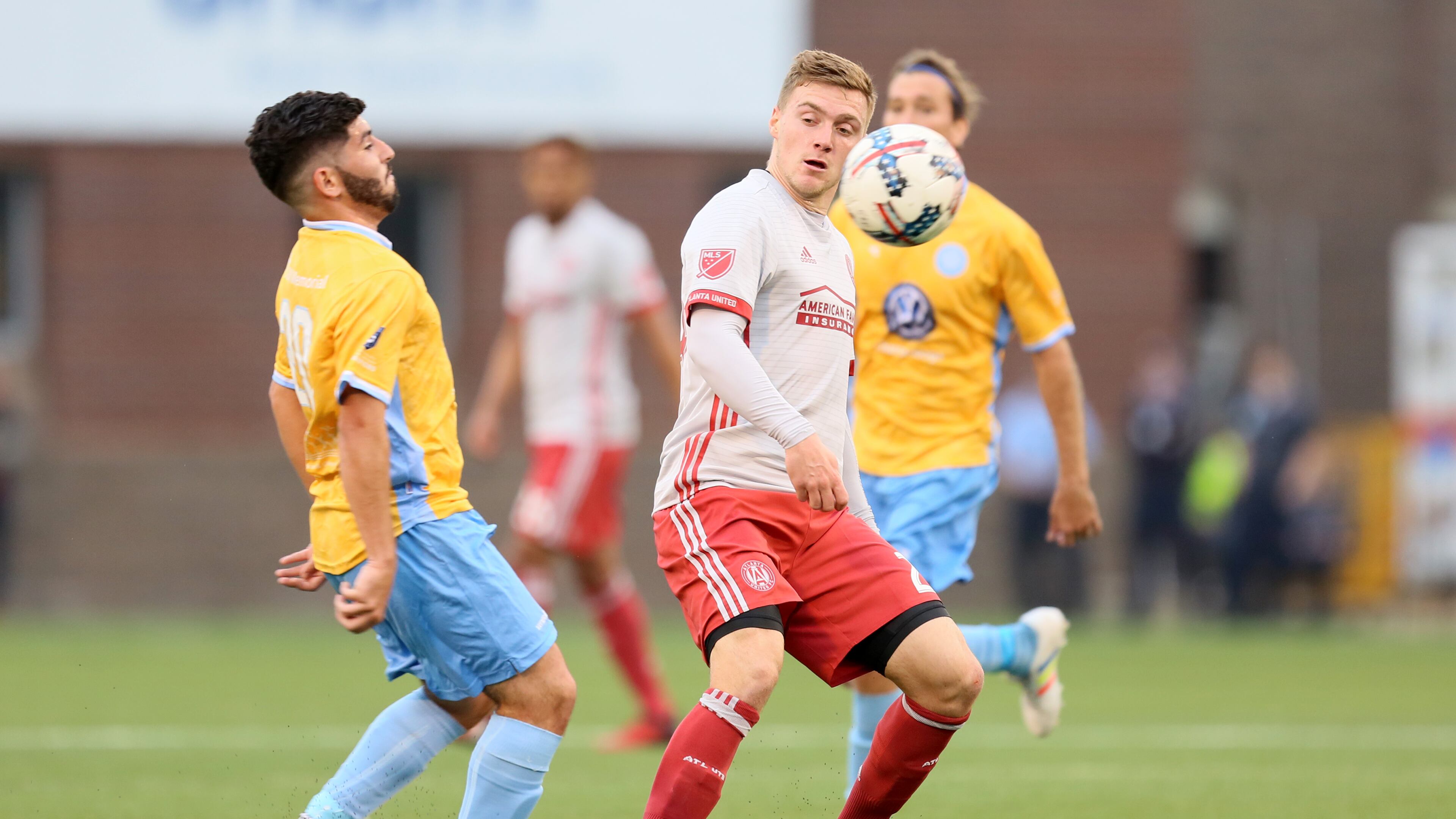 FEBRUARY 11, 2017 CHATTANOOGA TN Midfielder Julian Gressel disputes the ball with a Chattanooga midfielder.