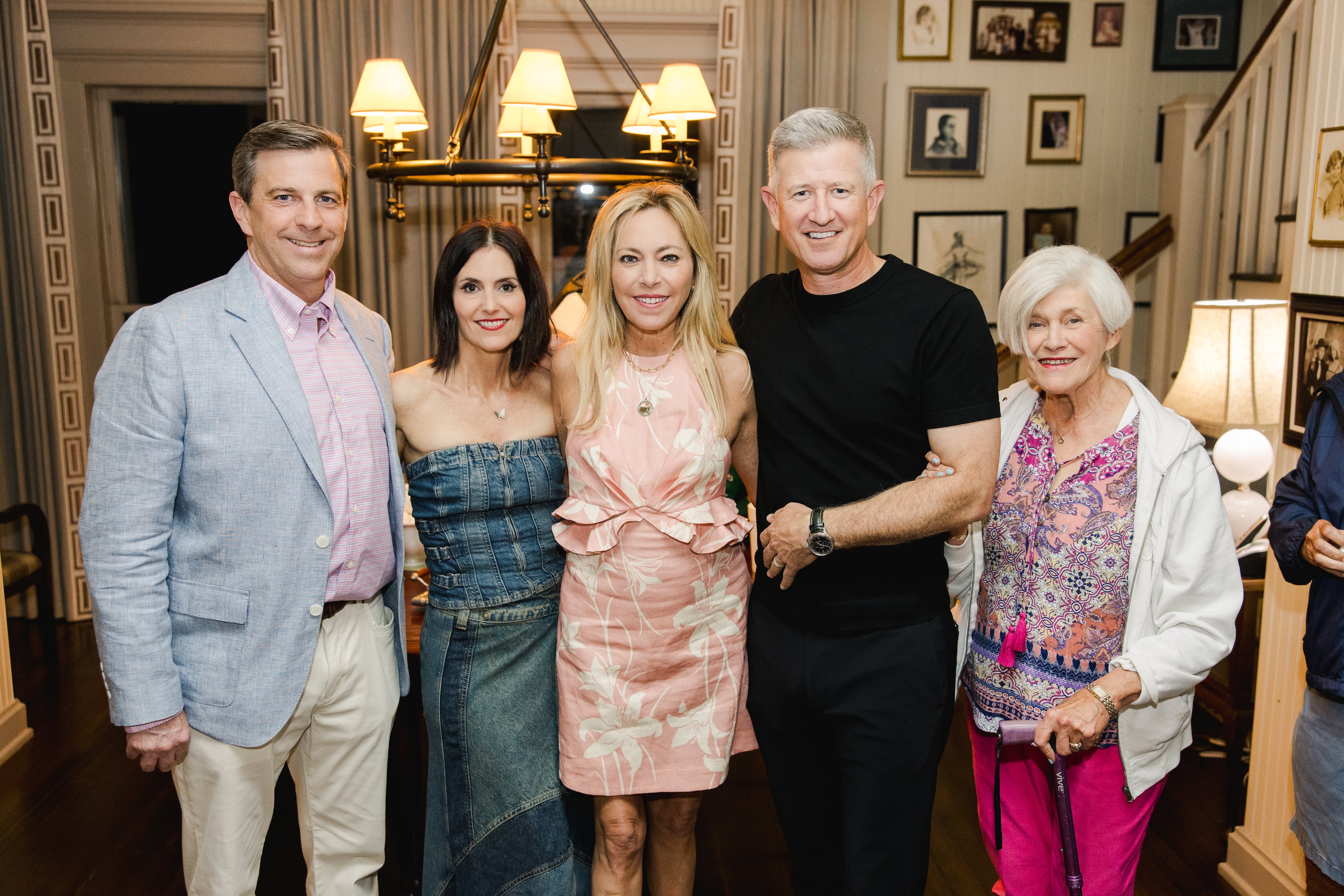 Sutton Stracke, center, is joined by guests during her 2024 Masters Tournament party in Augusta.
