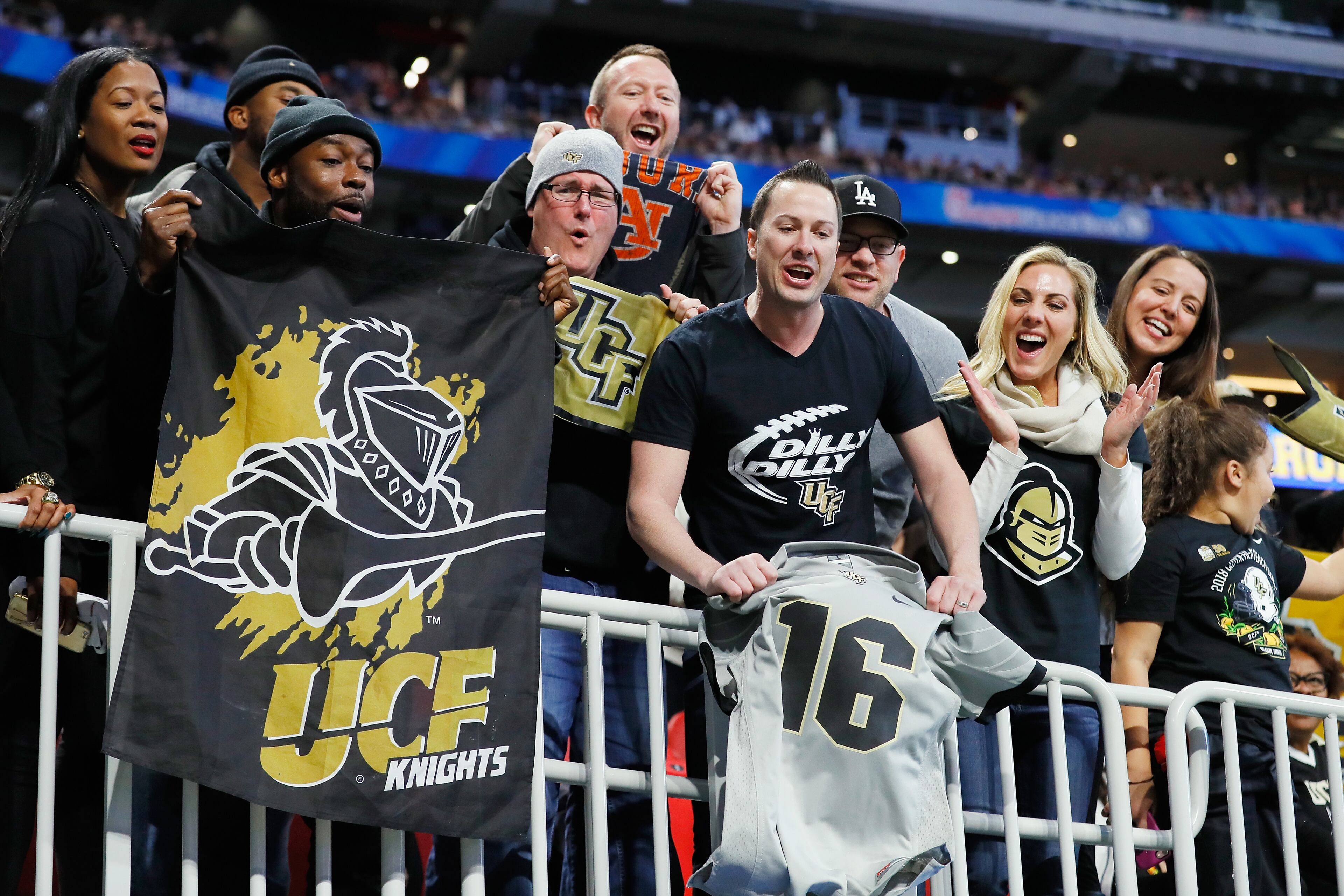 ATLANTA, GA - JANUARY 01: Fans cheer during the Chick-fil-A Peach Bowl between the Auburn Tigers and the UCF Knights at Mercedes-Benz Stadium on January 1, 2018 in Atlanta, Georgia. (Photo by Kevin C. Cox/Getty Images)