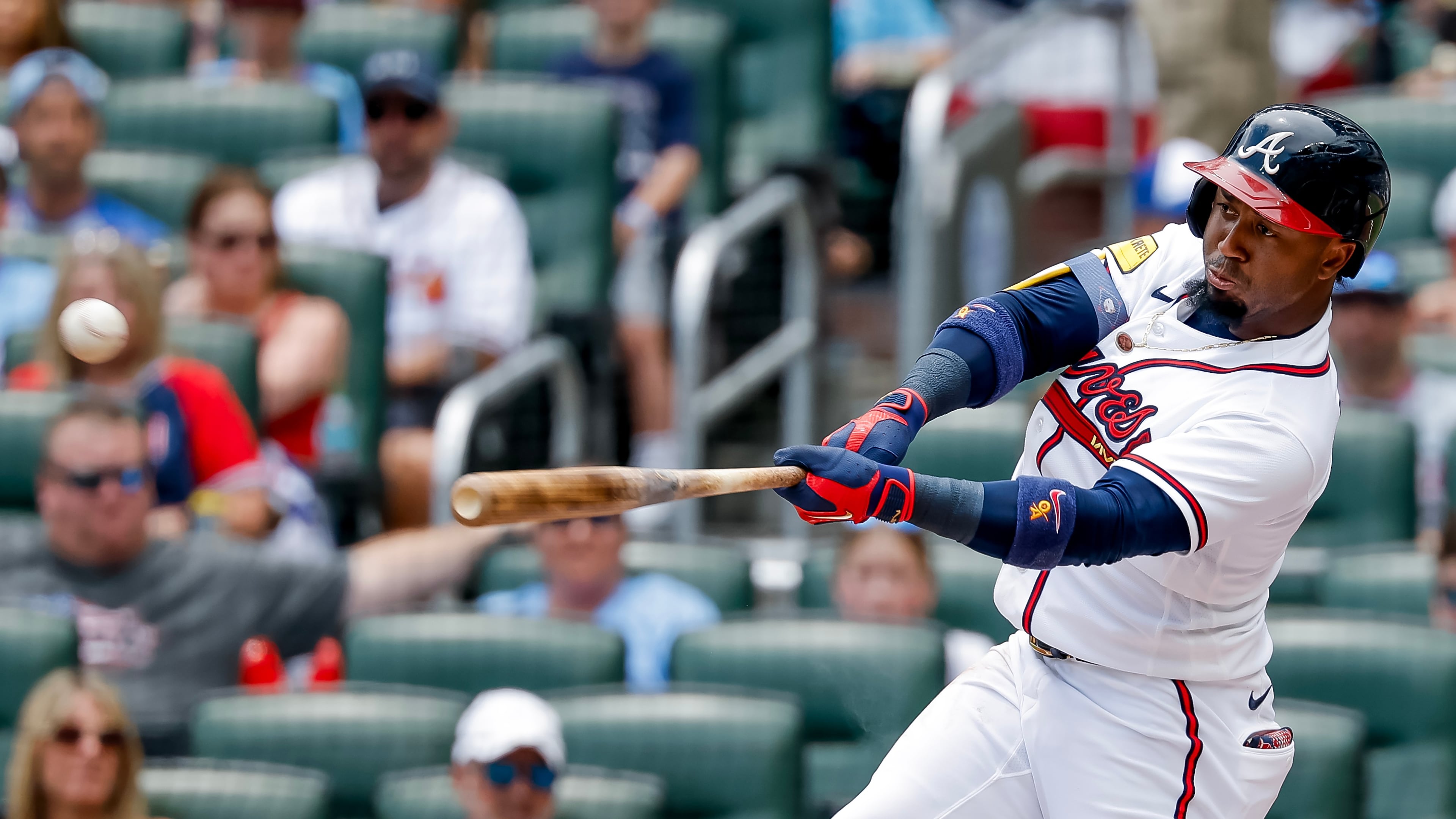 Atlanta Braves' Ozzie Albies hits a double against the New York Mets during the first inning of a baseball game, Sunday, July 5, 2026, in Atlanta. (AP Photo/Erik S. Lesser)