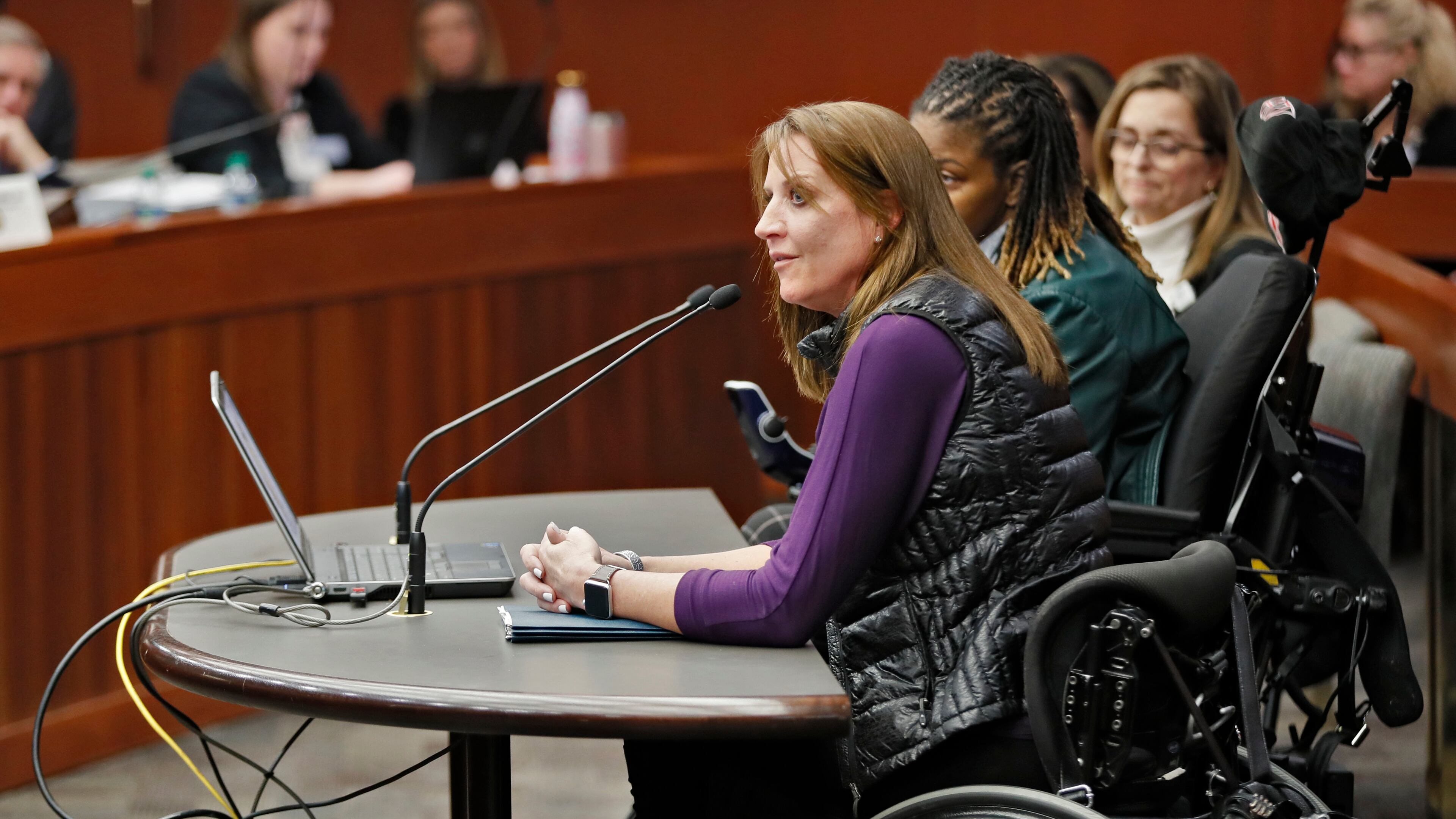 Acworth resident Janet Paulsen told a Senate panel that she would likely not be paralyed if the protective order she took out on her estranged husband had prohibited him from owning a gun. Bob Andres / bandres@ajc.com
