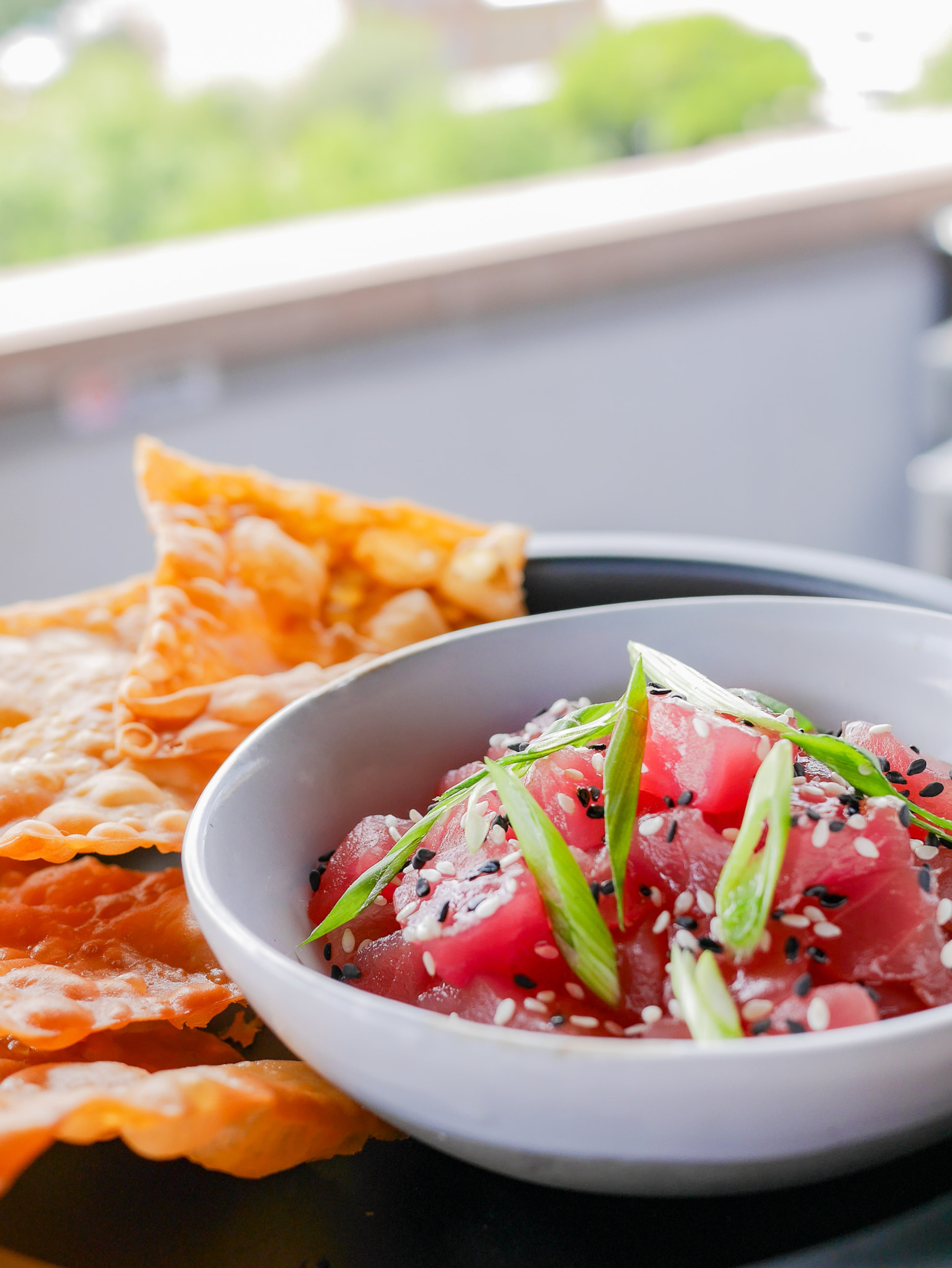 The Neon Fish's tuna tartare with ahi tuna, soy yuzu marinade, scallions and wonton chips. (Courtesy of Sorry Charlie's)