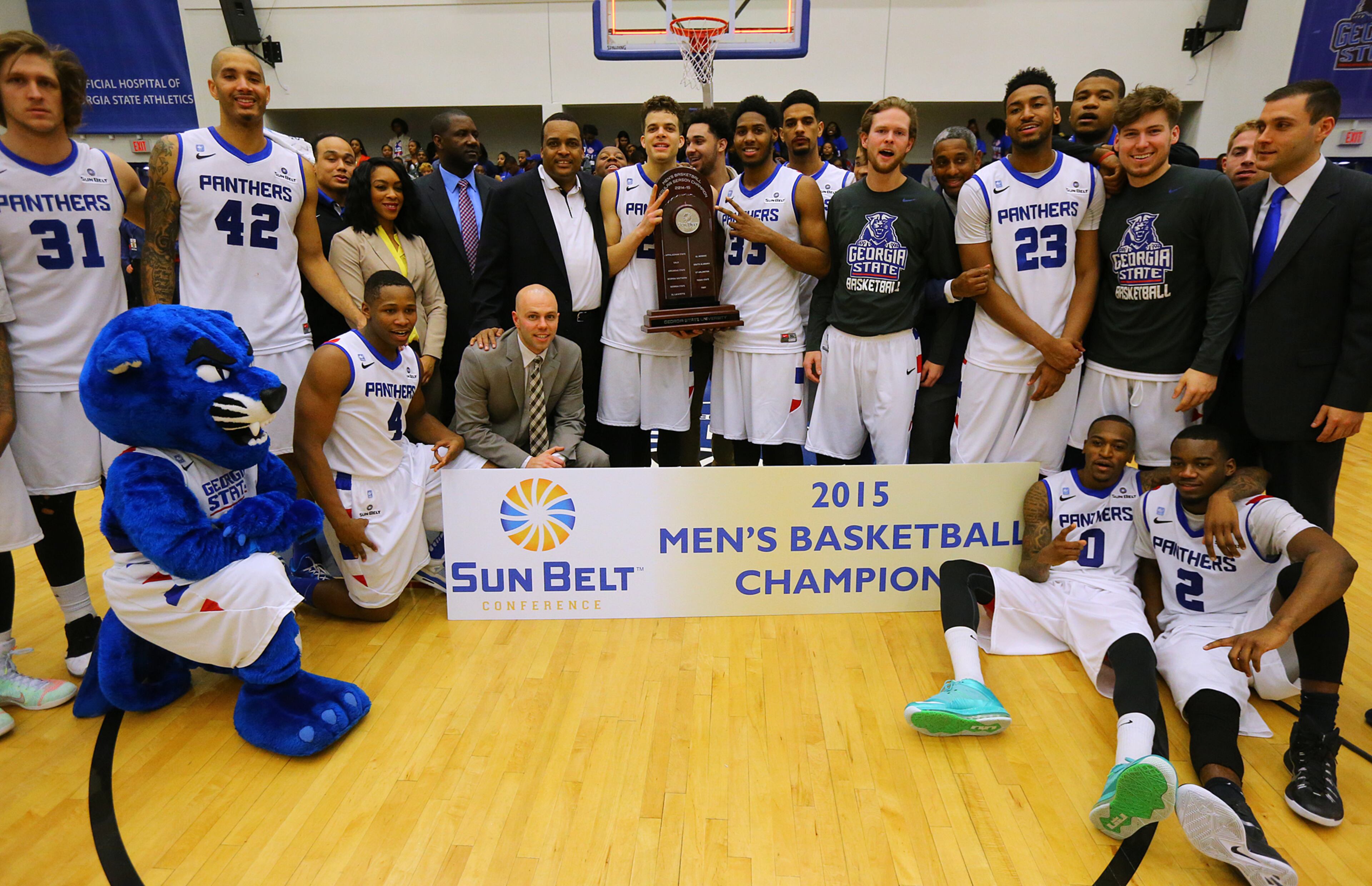 Georgia State gathers for a team photo on the court after winning the Sun Belt men's basketball regular season championship, beating Georgia Southern 72-55 in a basketball game on Saturday, March 7, 2015, in Atlanta.