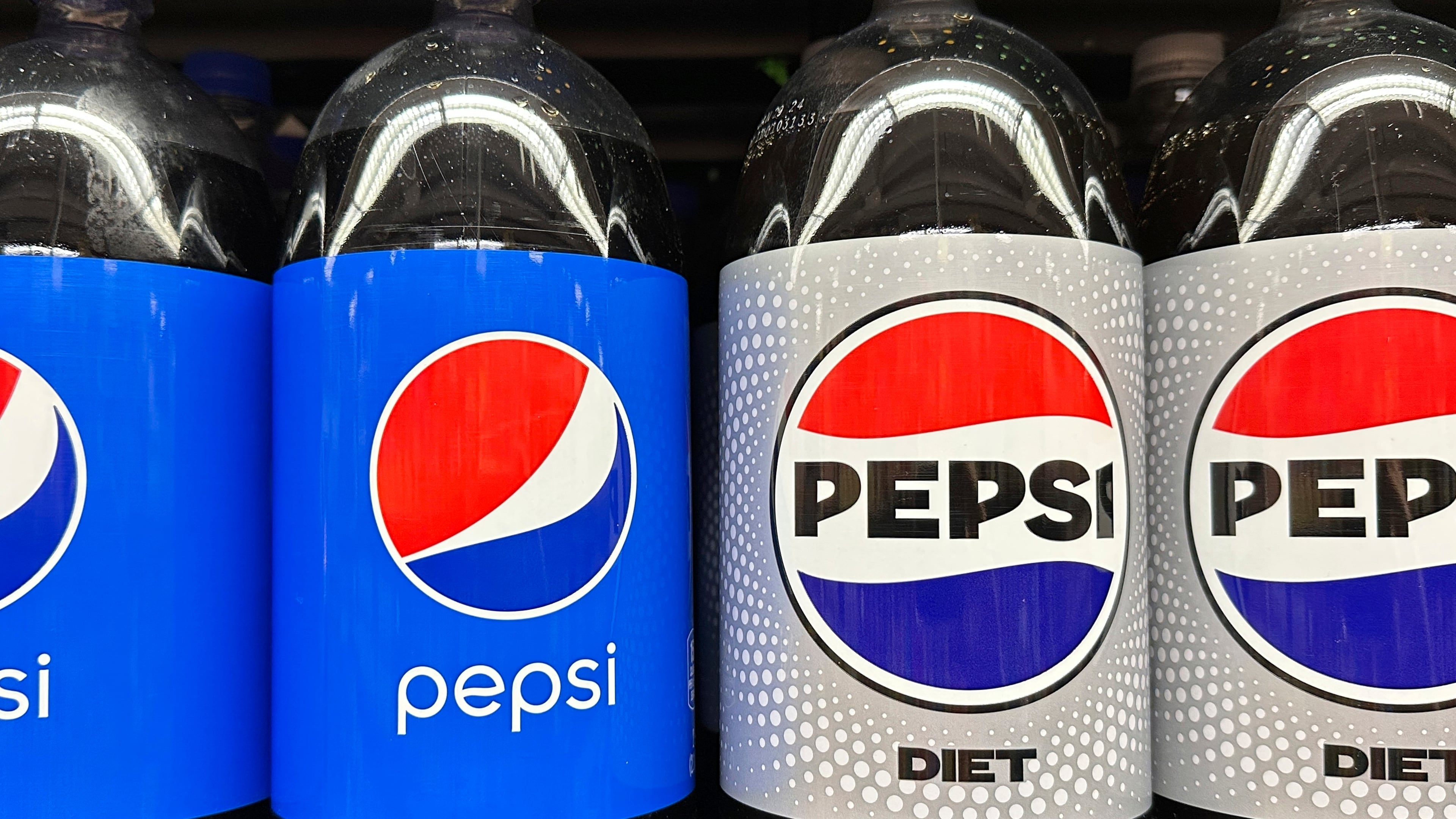 FILE - Plastic bottles of Pepsi are displayed at a grocery store in New York on Nov. 15, 2023. (AP Photo/Ted Shaffrey, File)
