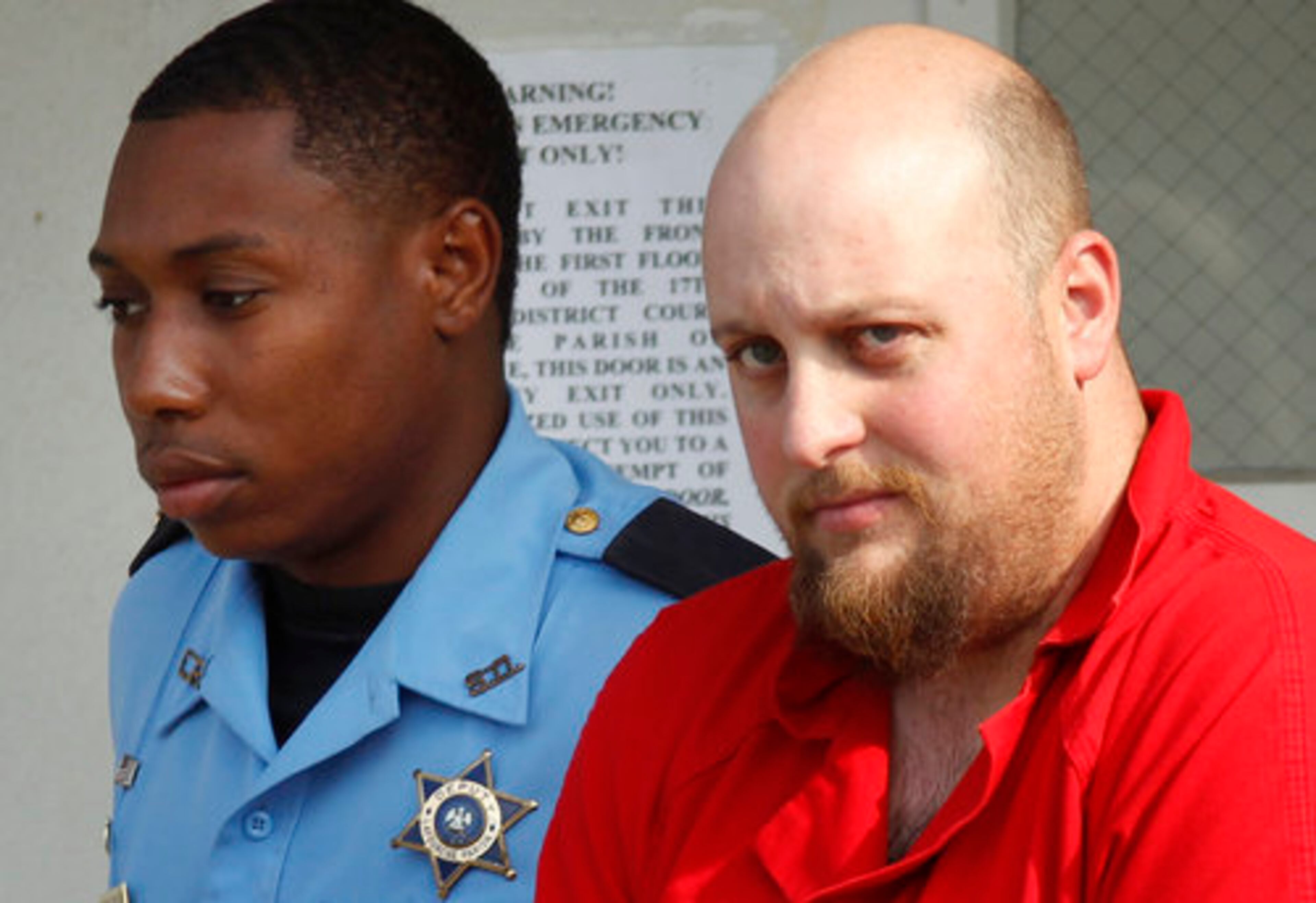 FACE OF EVIL--Jeremiah Lee Wright, 30, father of seven year old Jori Lirette, who was disabled and wheelchair-bound from cerebral palsy, and was found decapitated and dumped outside his home with Wright sitting nearby, is transported into District Court to face murder charges in the boy's death, in Thibodaux, La., Tuesday, Aug. 16, 2011. Wright confessed to killing Jori Lirette within 30 minutes of being brought to the police station Sunday, Thibodaux Police Chief Scott Silverii said Monday.