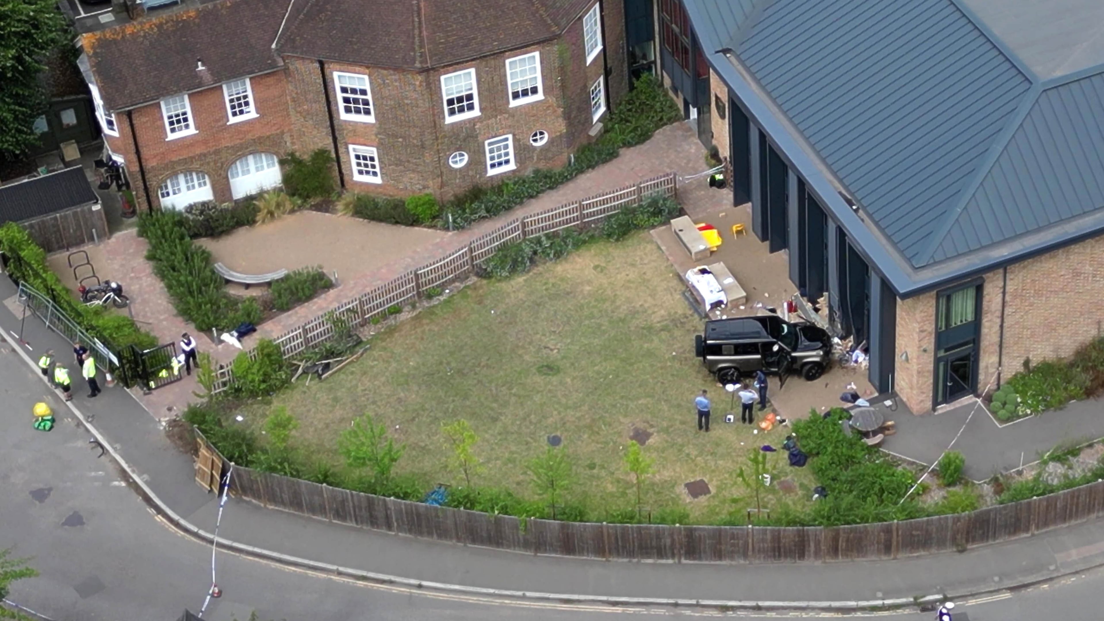 A Land Rover Defender inside the grounds of The Study Preparatory School in Camp Road, Wimbledon, south London, on July 6, 2023. (Yui Mok/PA via AP)