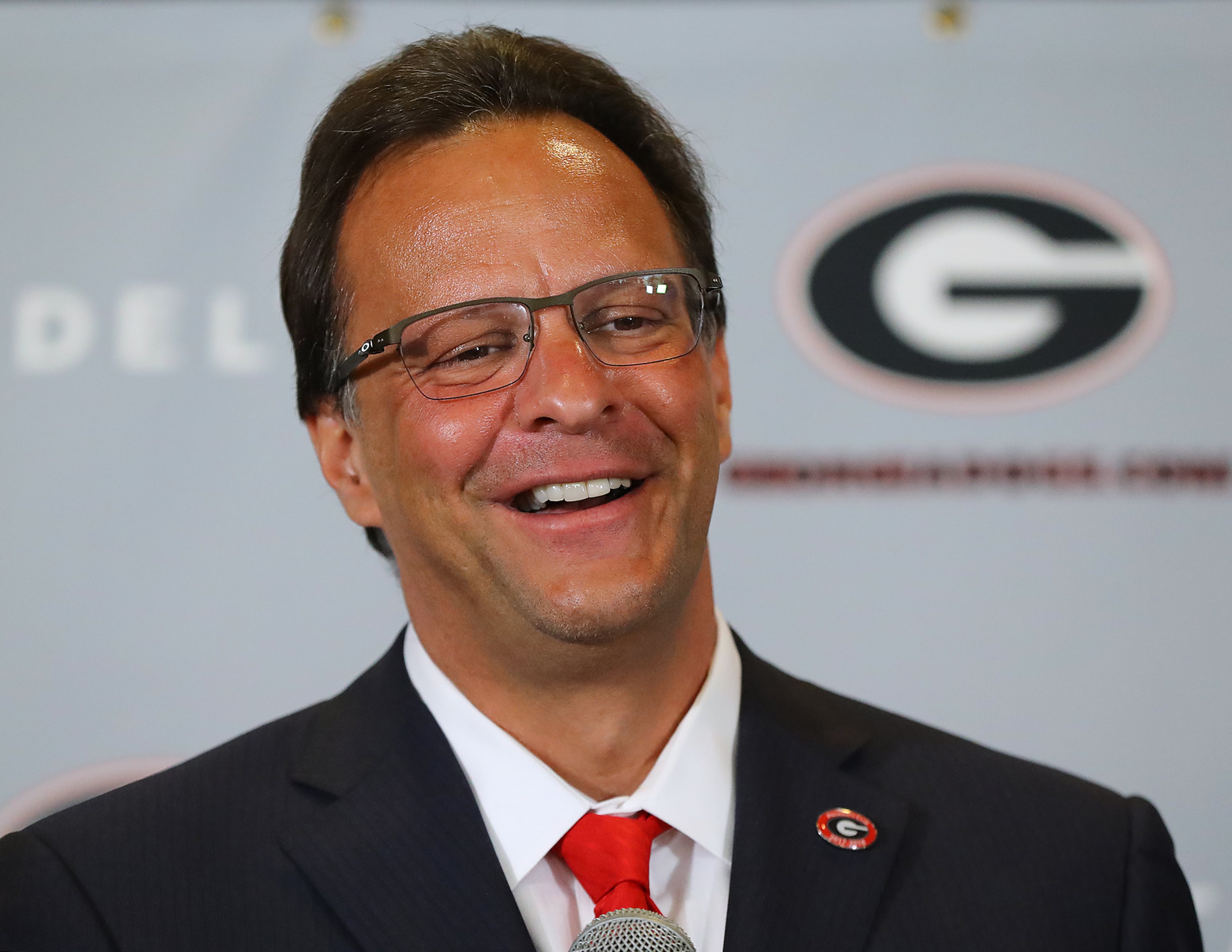 March 16, 2018 Athens: Tom Crean is all smiles while being introduced as the new men's basketball head coach at the University of Georgia on Friday, March 16, 2018, at Stegeman Coliseum in Athens. Crean compiled a 356-231 record in 18 seasons at Marquette and Indiana from 1999-2017. Curtis Compton/ccompton@ajc.com