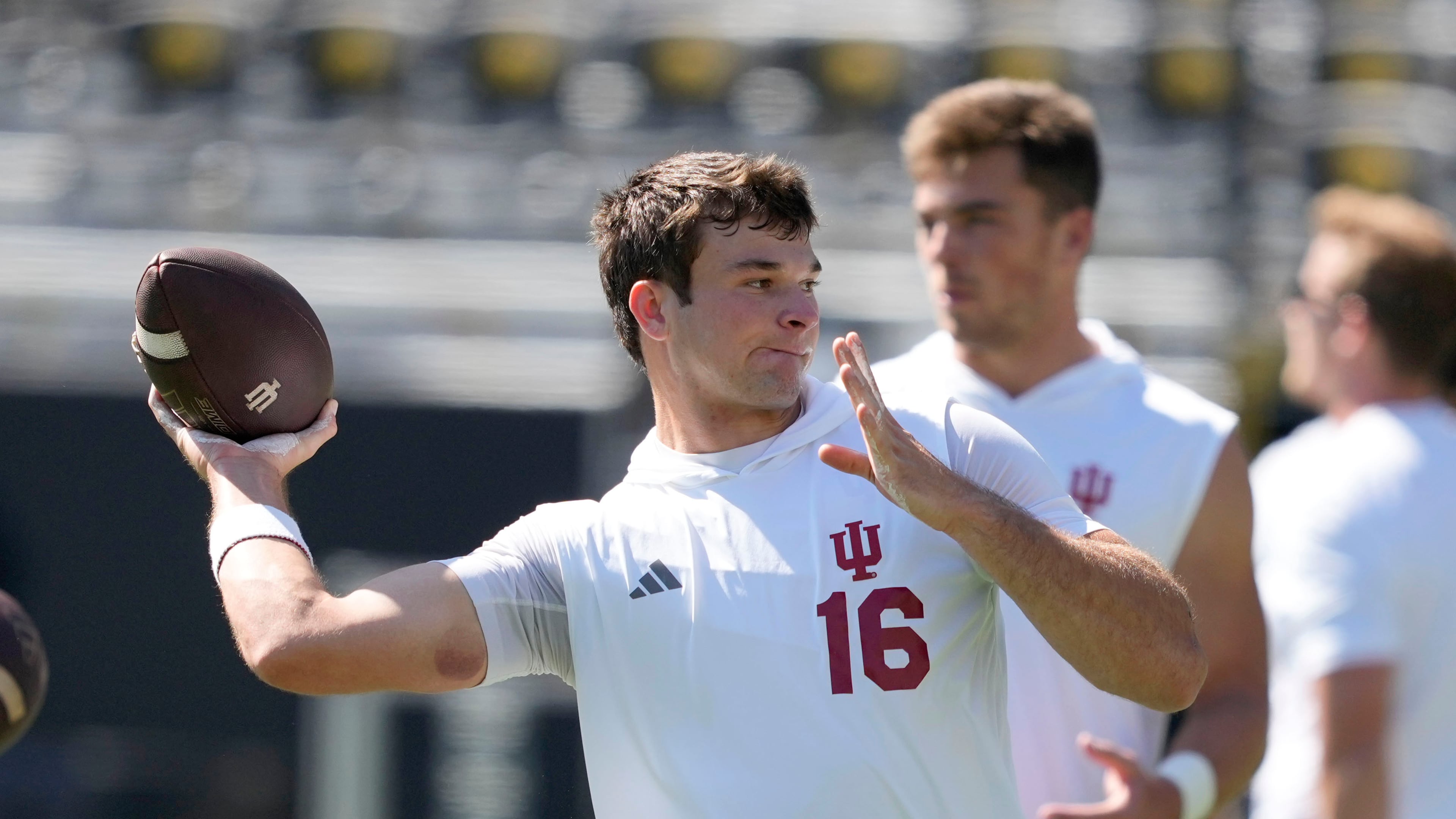 FILE - Indiana quarterback Alberto Mendoza warms up before an NCAA college football game against Iowa, Saturday, Sept. 27, 2025, in Iowa City, Iowa. (AP Photo/Charlie Neibergall, File)