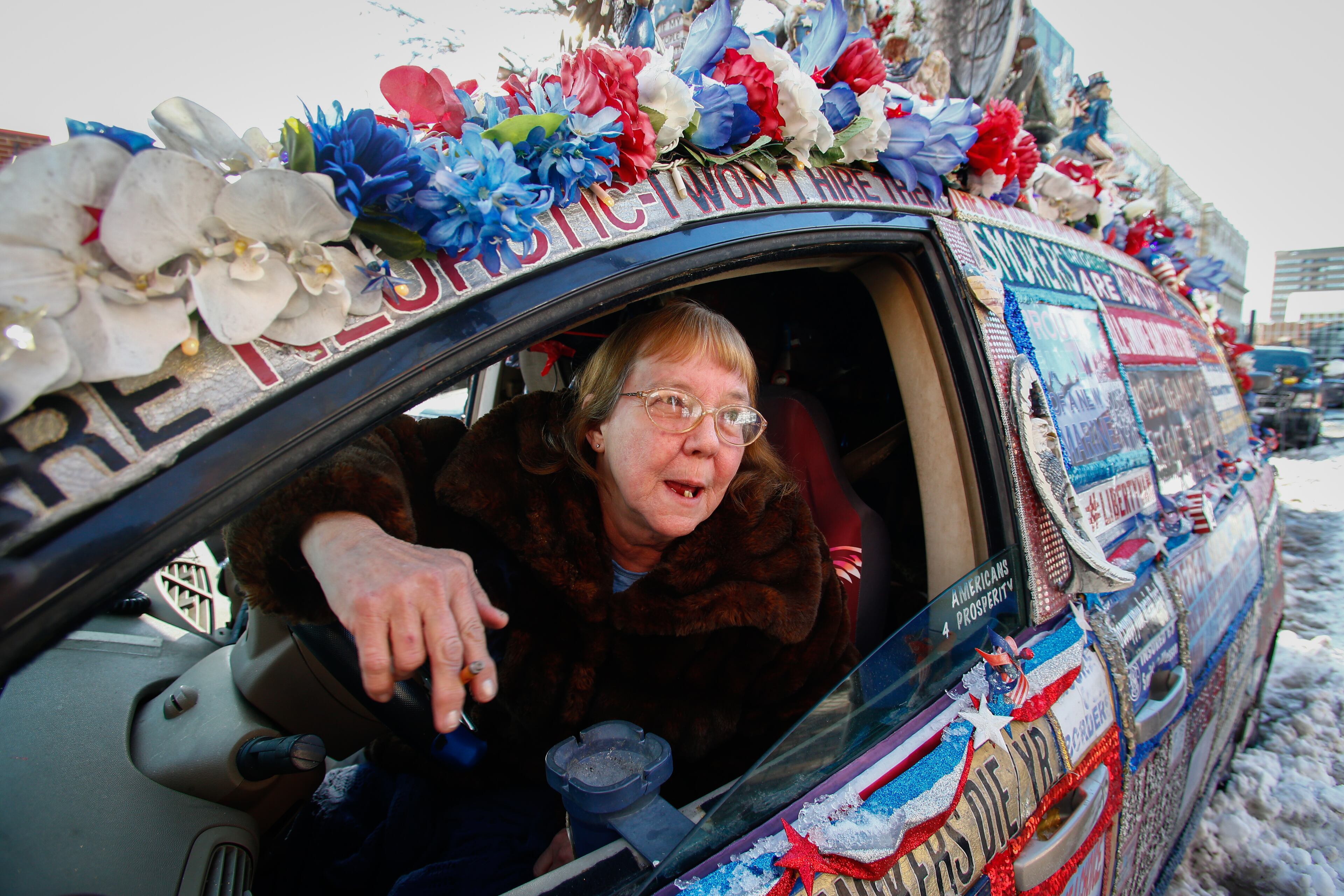 Activist and Ted Cruz supporter Lynda Farley of Edmonton, KY, talks to members of the media outside of the Red Arrow Diner as Cruz campaigns inside on February 9, 2016 in Manchester, New Hampshire. (Photo by Matthew Cavanaugh/Getty Images)