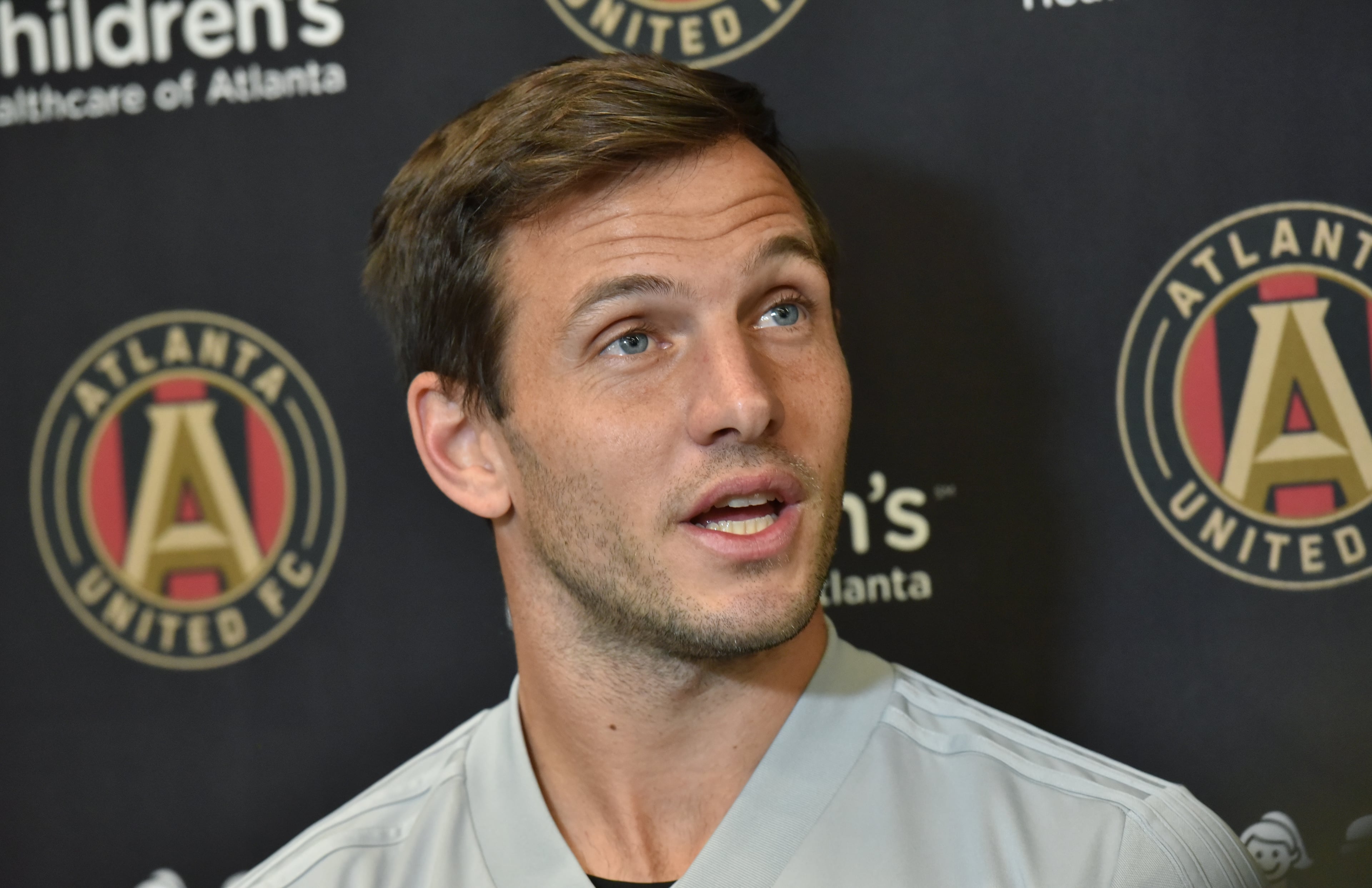 Midfielder Kevin Kratz (32) speaks to members of the press prior to Tuesday's practice at Children's Healthcare of Atlanta Training Ground in Marietta. (Hyosub Shin/hshin@ajc.com)