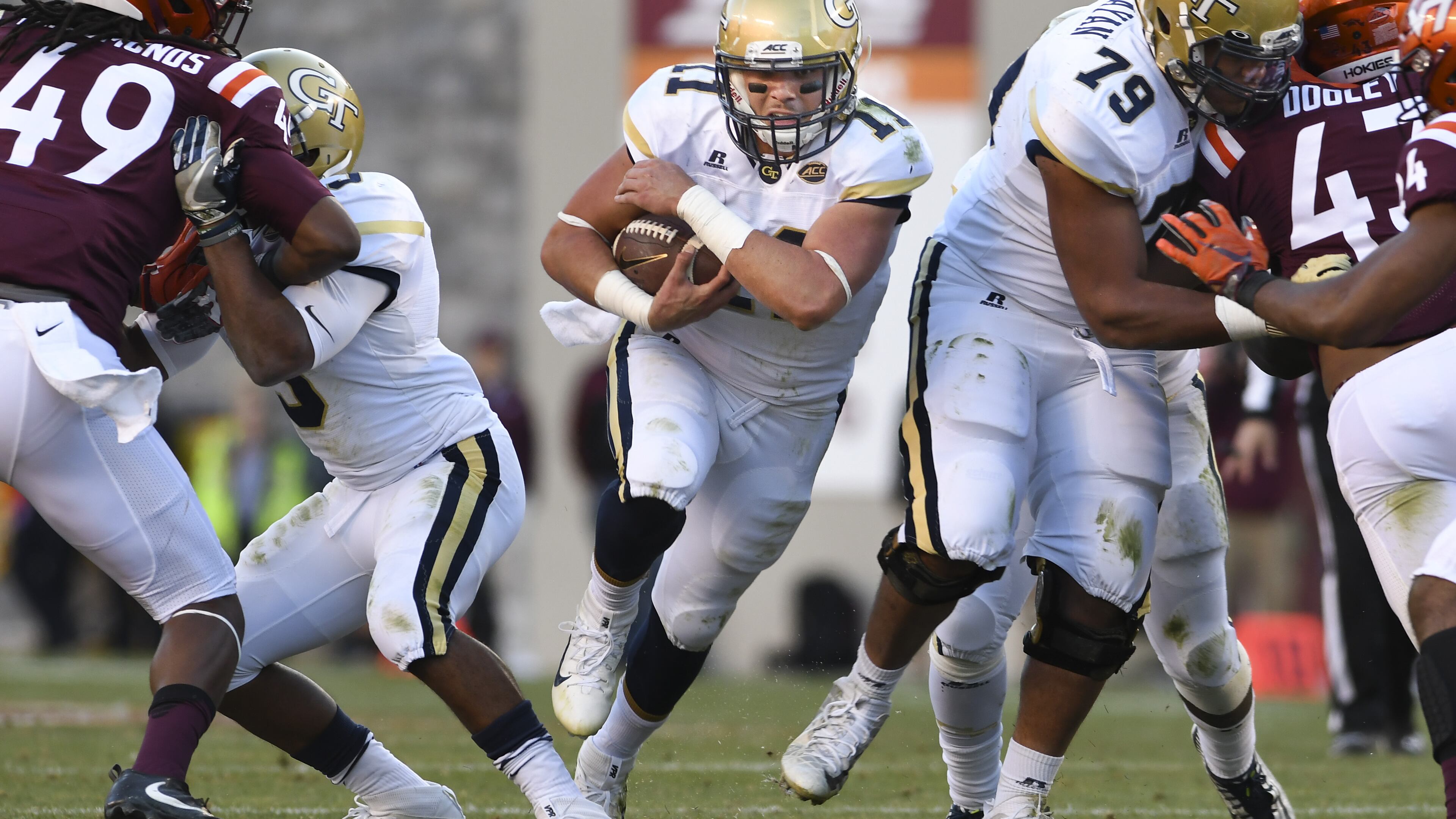 BLACKSBURG, VA - NOVEMBER 12: Quarterback Matthew Jordan #11 of the Georgia Tech Yellow Jackets carries the ball against the Virginia Tech Hokies in the first half at Lane Stadium on November 12, 2016 in Blacksburg, Virginia. (Photo by Michael Shroyer/Getty Images)