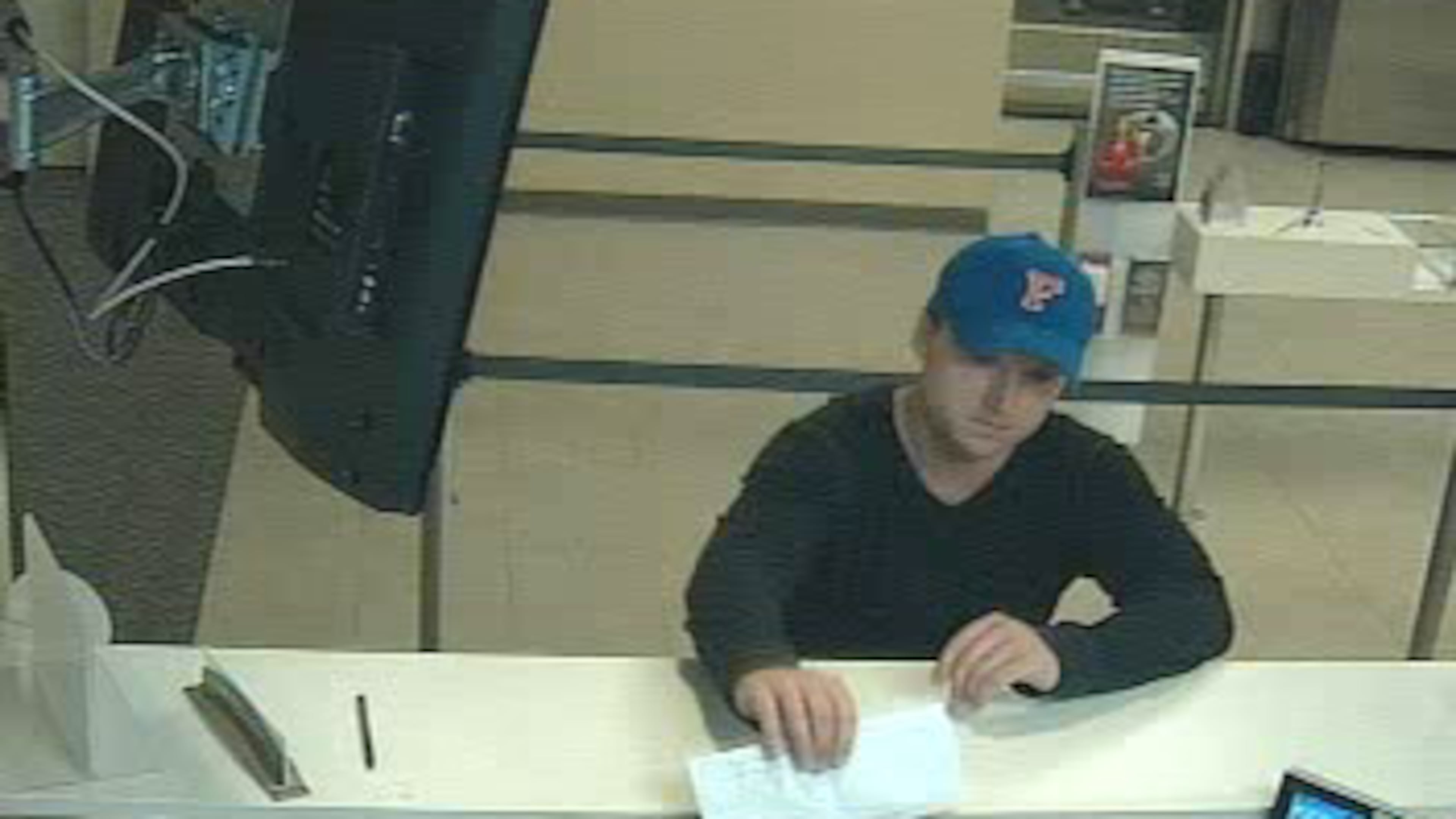 Sandy Springs police are looking this man, who they say robbed a Wells Fargo bank on Friday afternoon. (Surveillance)
