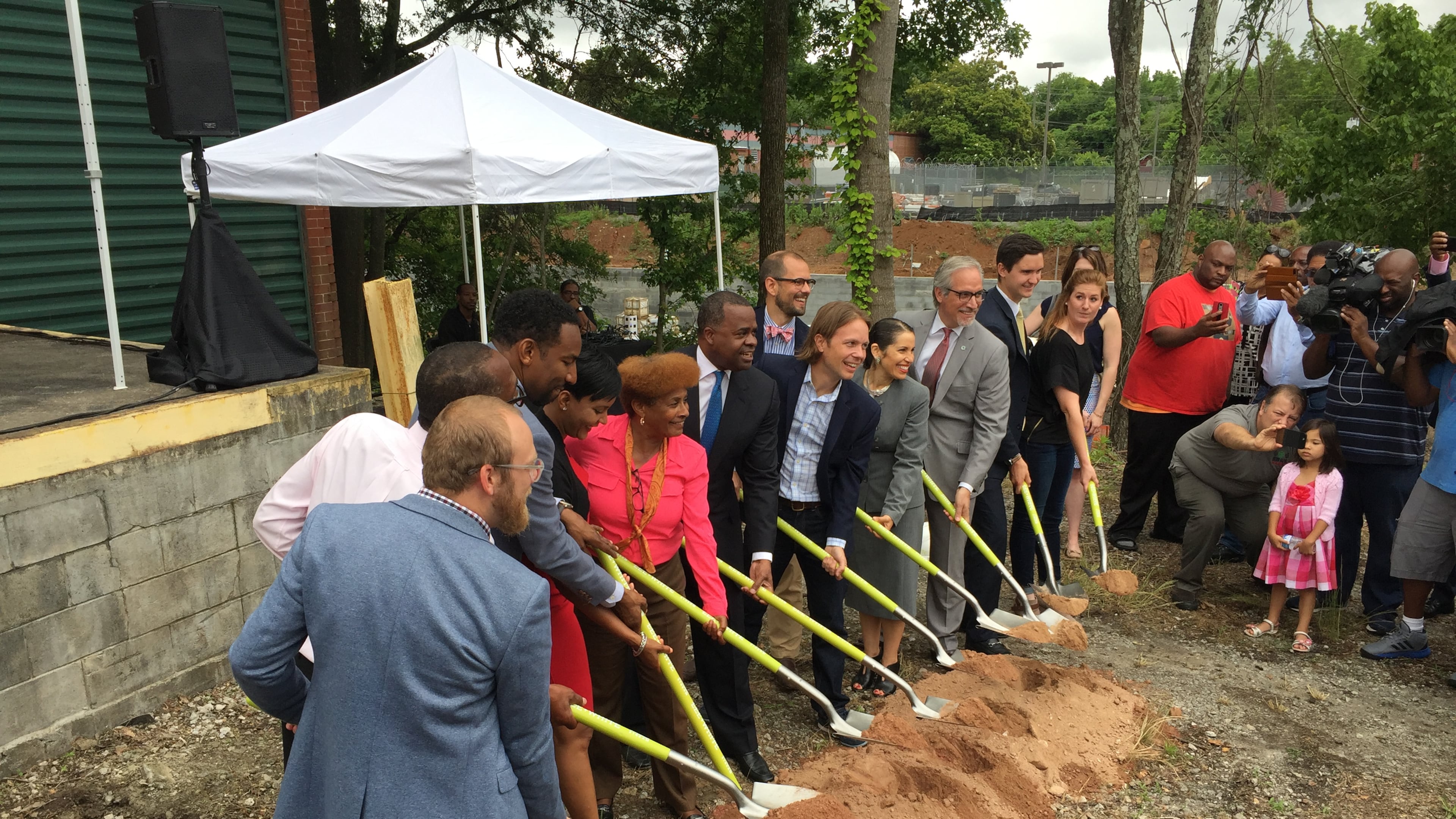 Atlanta Mayor Kasim Reed and City Councilwoman Cleta Winslow help break ground on manufacturing facility on Tuesday for Monday Night Brewing.